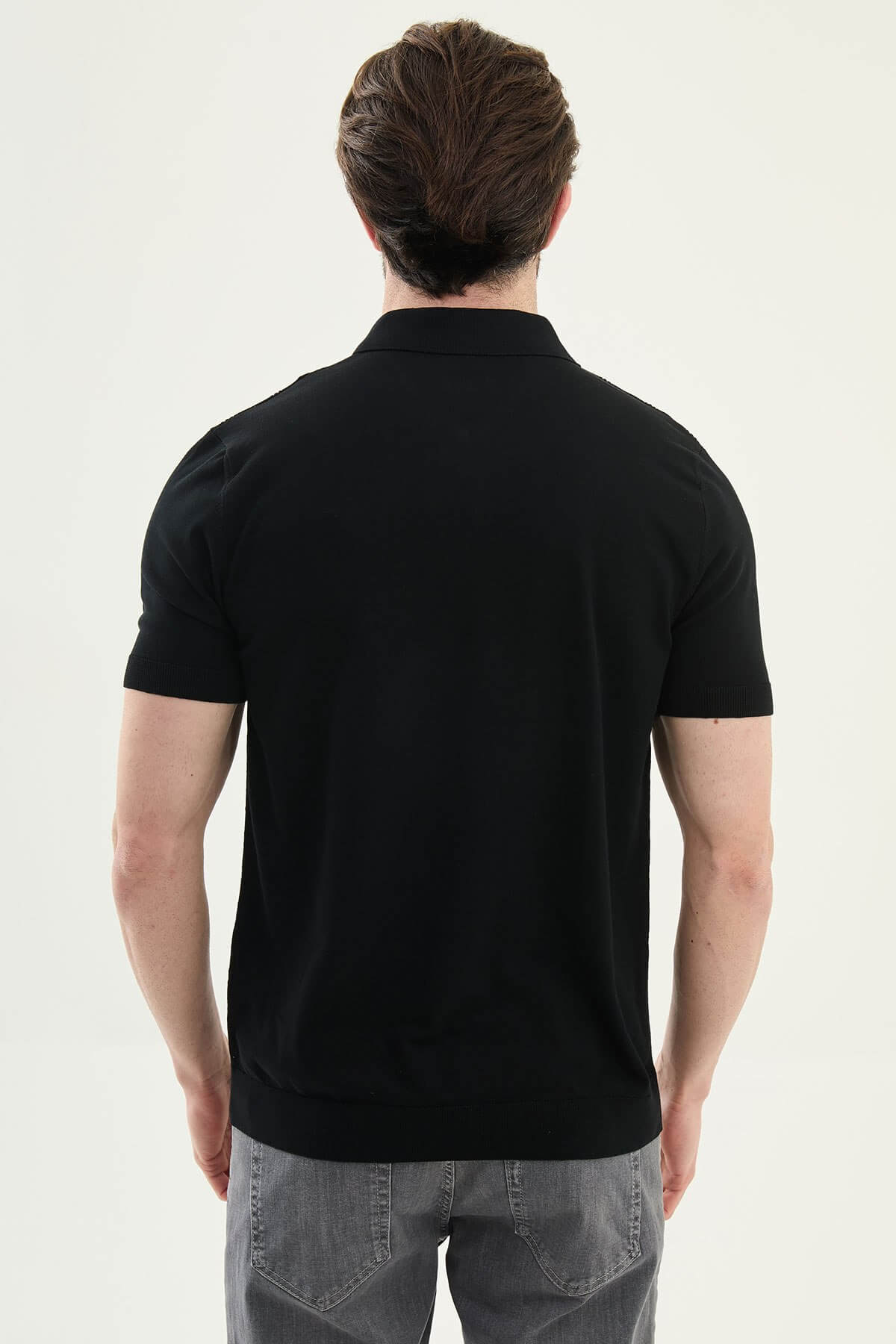 Men’s black textured knit polo shirt with zip collar, slim fit, breathable cotton blend, modern smart casual style