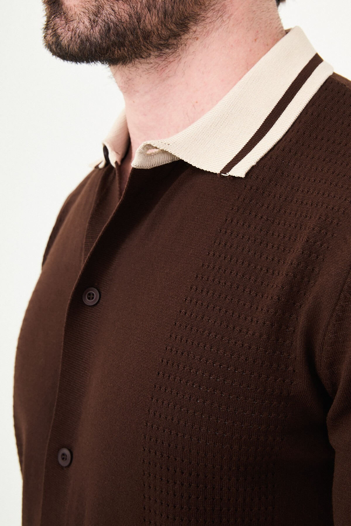 Men’s brown short sleeve knit polo shirt with button front, contrast tipped collar, textured side panels, slim fit smart casual style