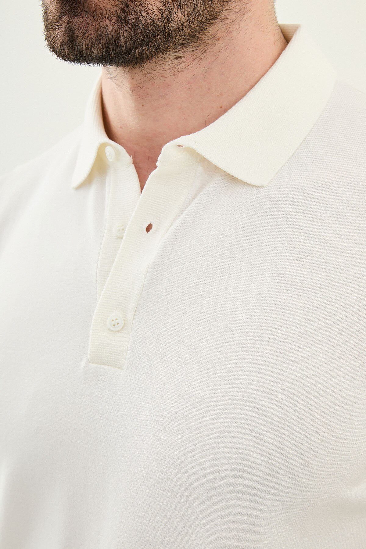 Men’s ecru slim fit cotton polo shirt with short sleeves, lightweight breathable fabric, clean minimal casual style