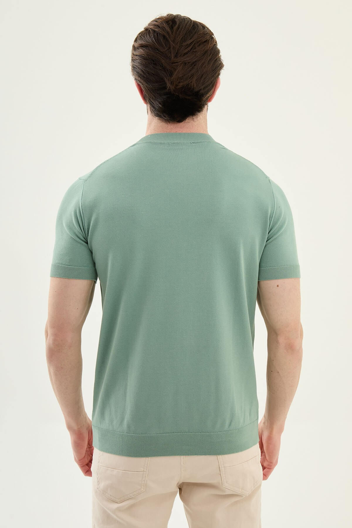 Men’s green slim fit crew neck knit t-shirt with short sleeves, cotton stretch fabric, smart casual seasonal style