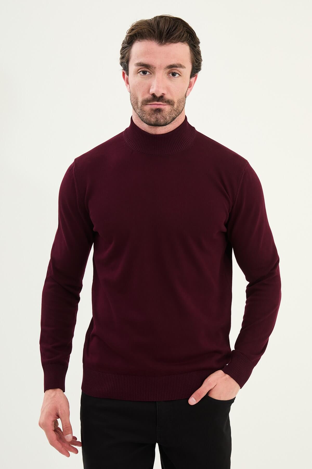 Man wearing a burgundy slim fit half-turtleneck knitwear sweater from the Fall-Winter collection.