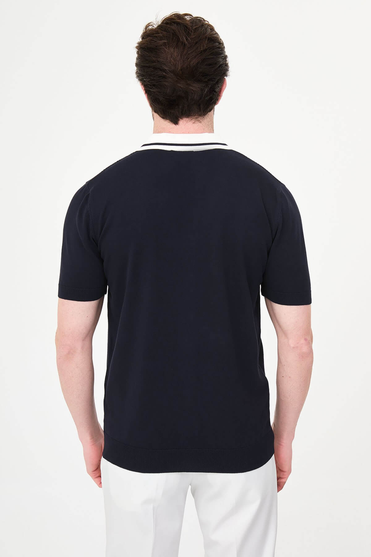 Men’s navy blue short sleeve knit polo shirt with button front, contrast tipped collar, textured side panels, slim fit smart casual style