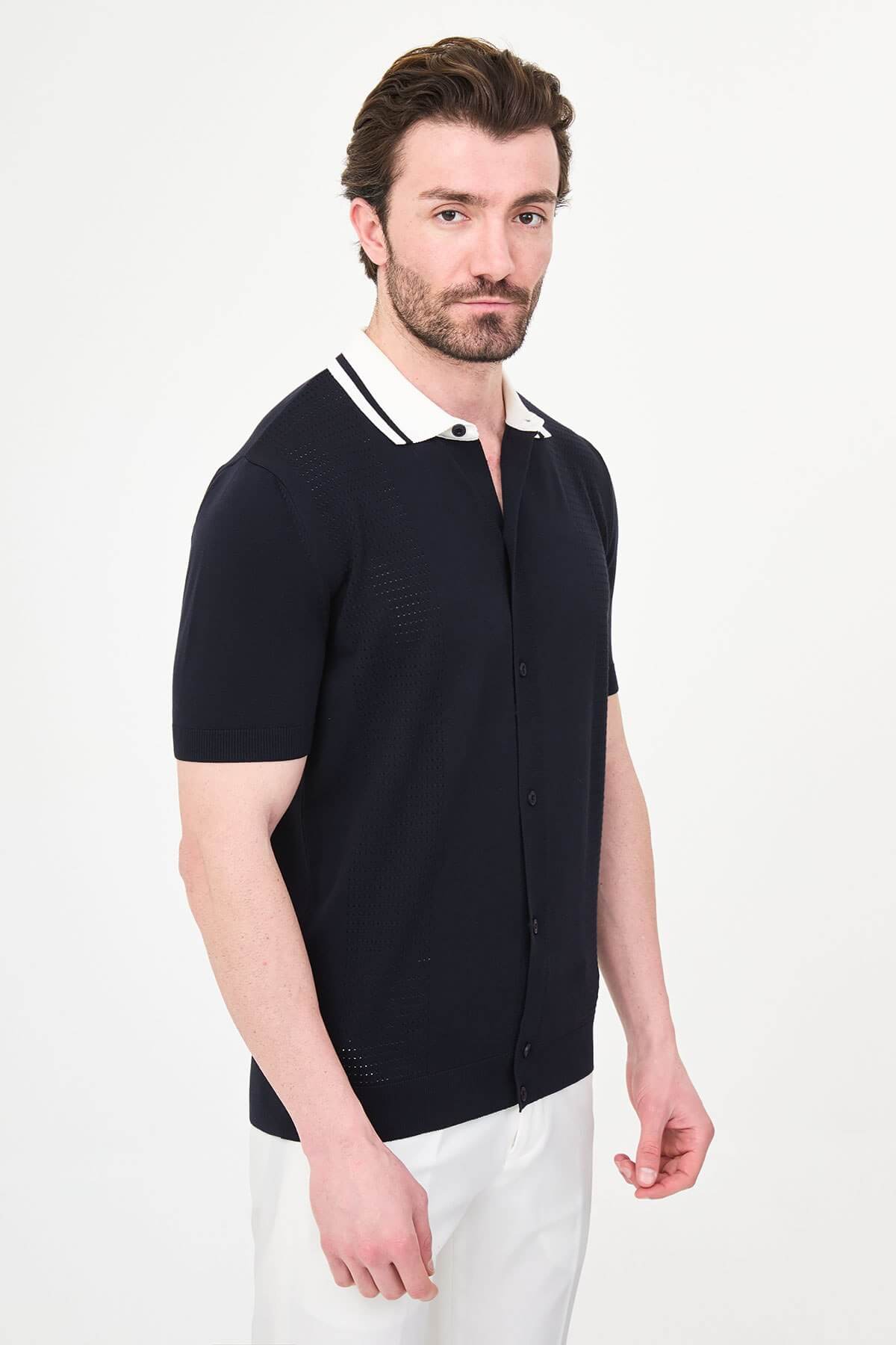 Men’s navy blue short sleeve knit polo shirt with button front, contrast tipped collar, textured side panels, slim fit smart casual style