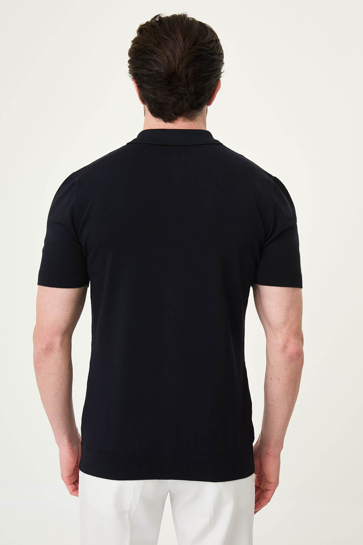 Men’s navy blue slim fit short sleeve knitwear shirt with button-up front, soft viscose fabric, modern versatile style