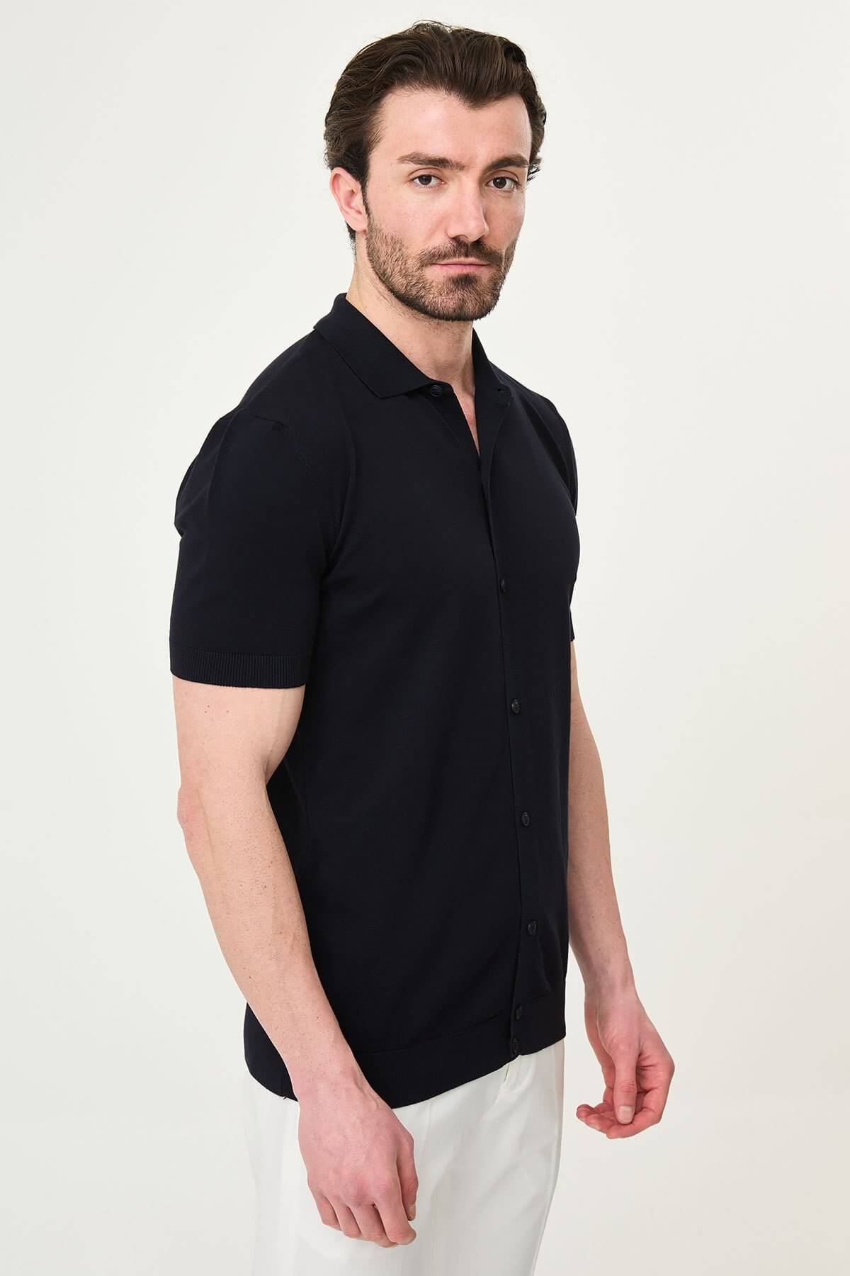 Men’s navy blue slim fit short sleeve knitwear shirt with button-up front, soft viscose fabric, modern versatile style