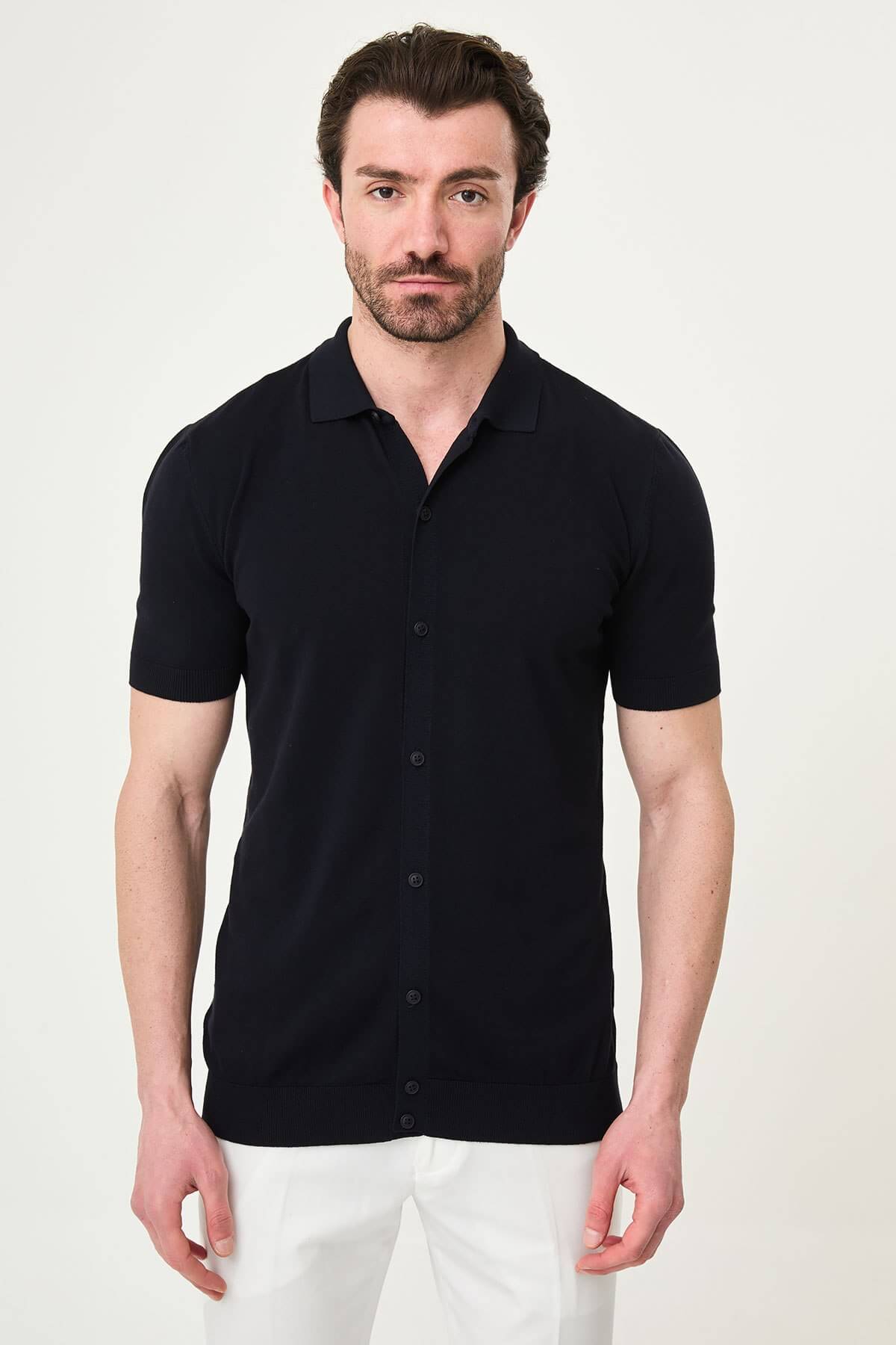 Men’s navy blue slim fit short sleeve knitwear shirt with button-up front, soft viscose fabric, modern versatile style