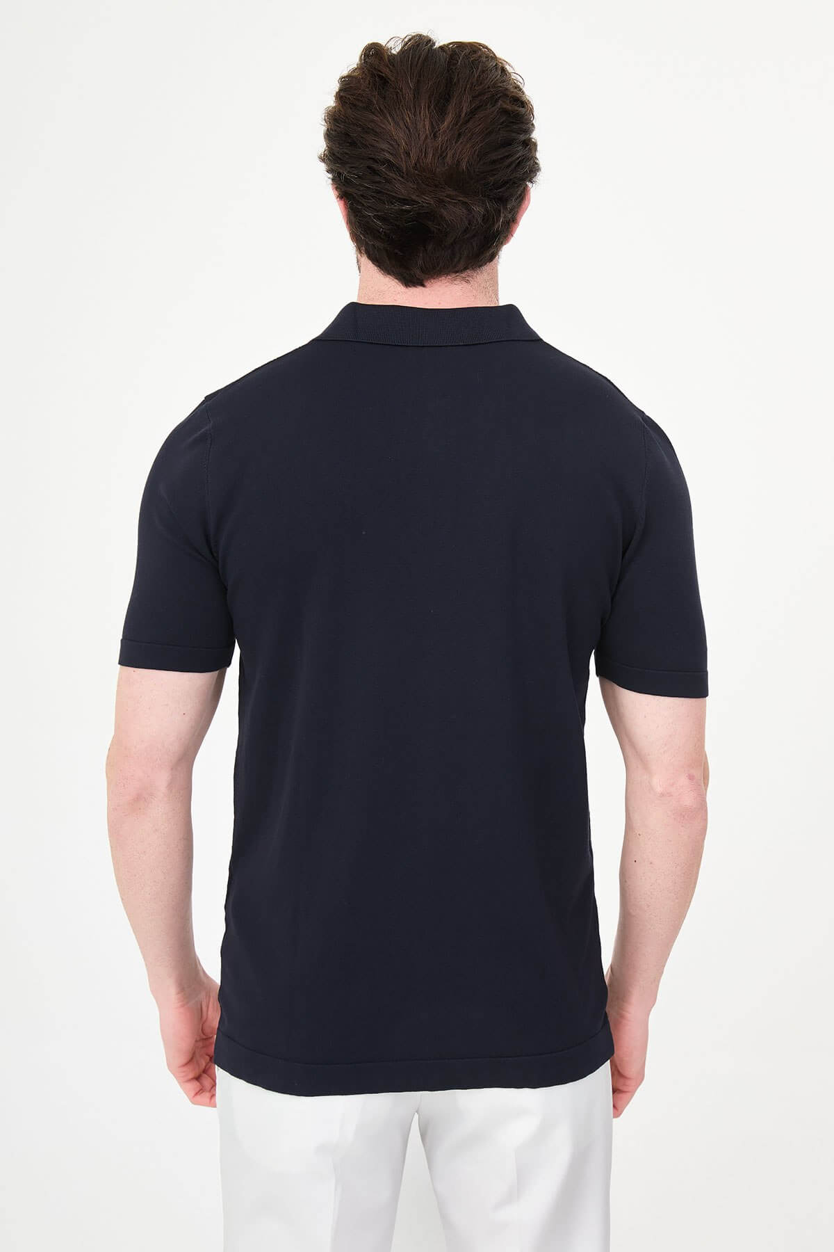 Men’s navy blue slim fit knit polo T-shirt with textured diamond pattern, short sleeves, tailored fit, smart casual style