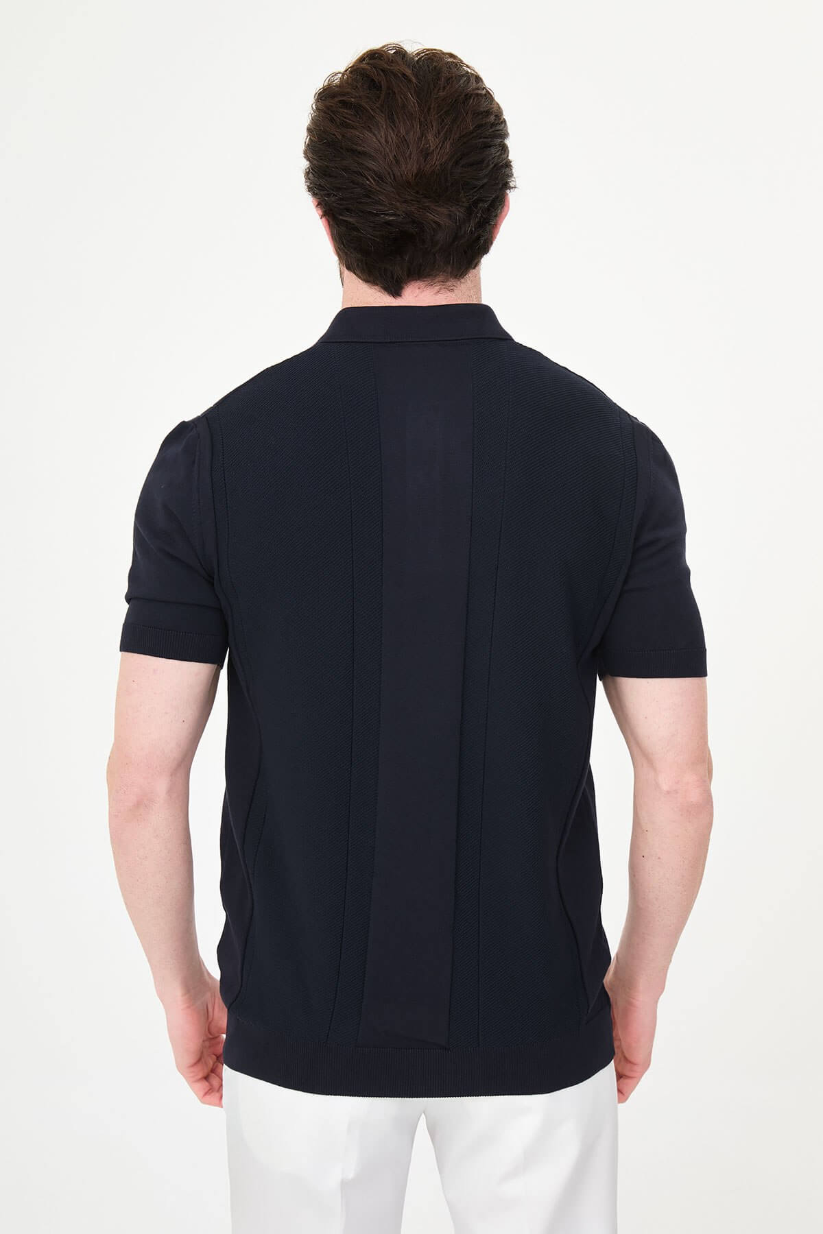Men’s navy blue slim fit textured knit polo T-shirt with vertical panel design, short sleeves, classic collar, modern minimal style