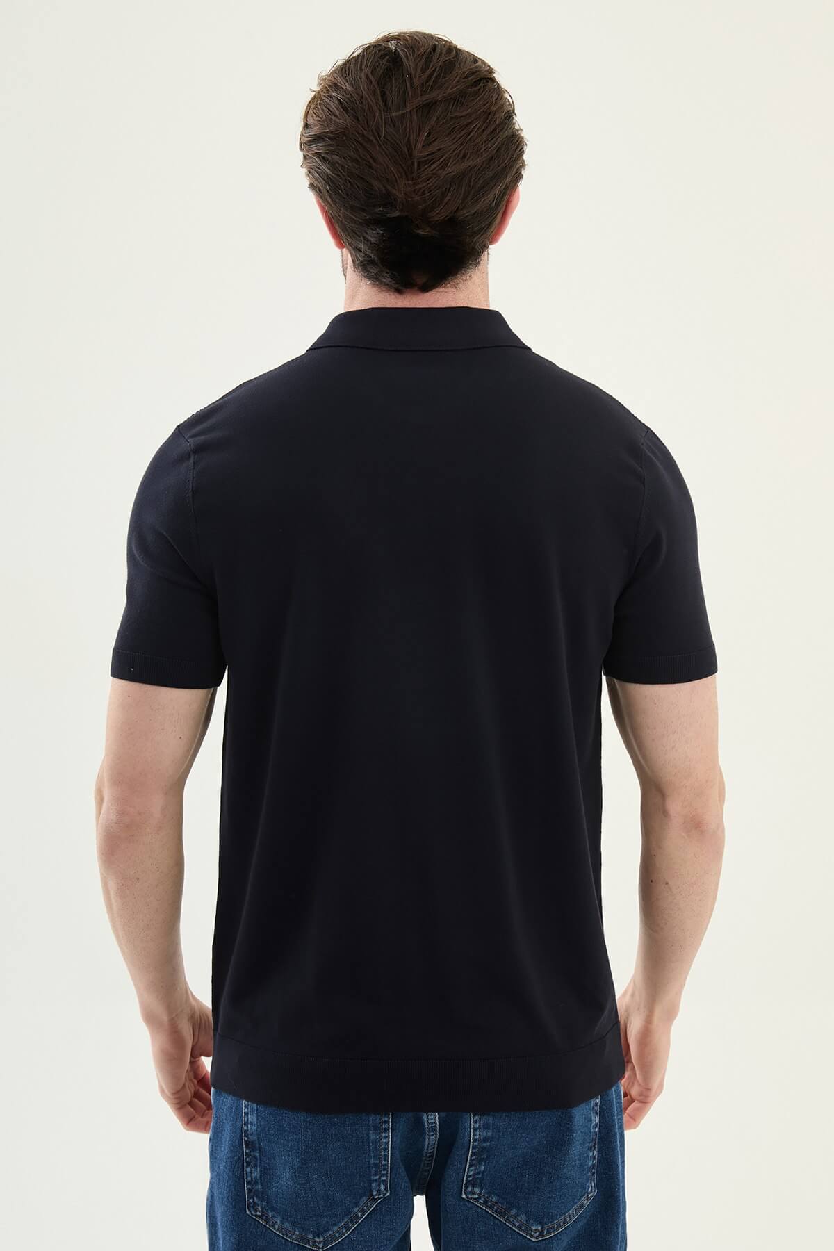 Men’s navy blue textured knit polo shirt with zip collar, slim fit, breathable cotton blend, smart casual style