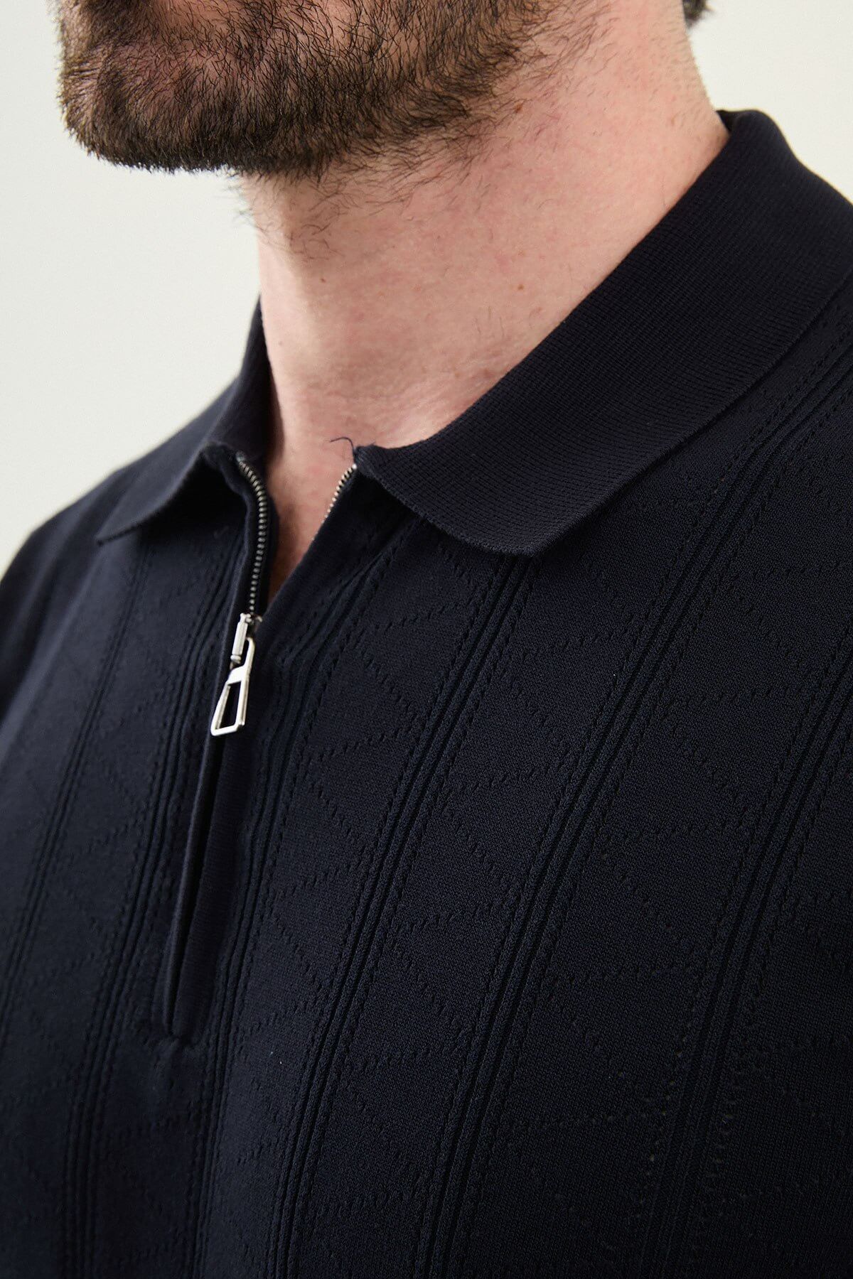 Men’s navy blue textured knit polo shirt with zip collar, slim fit, breathable cotton blend, smart casual style