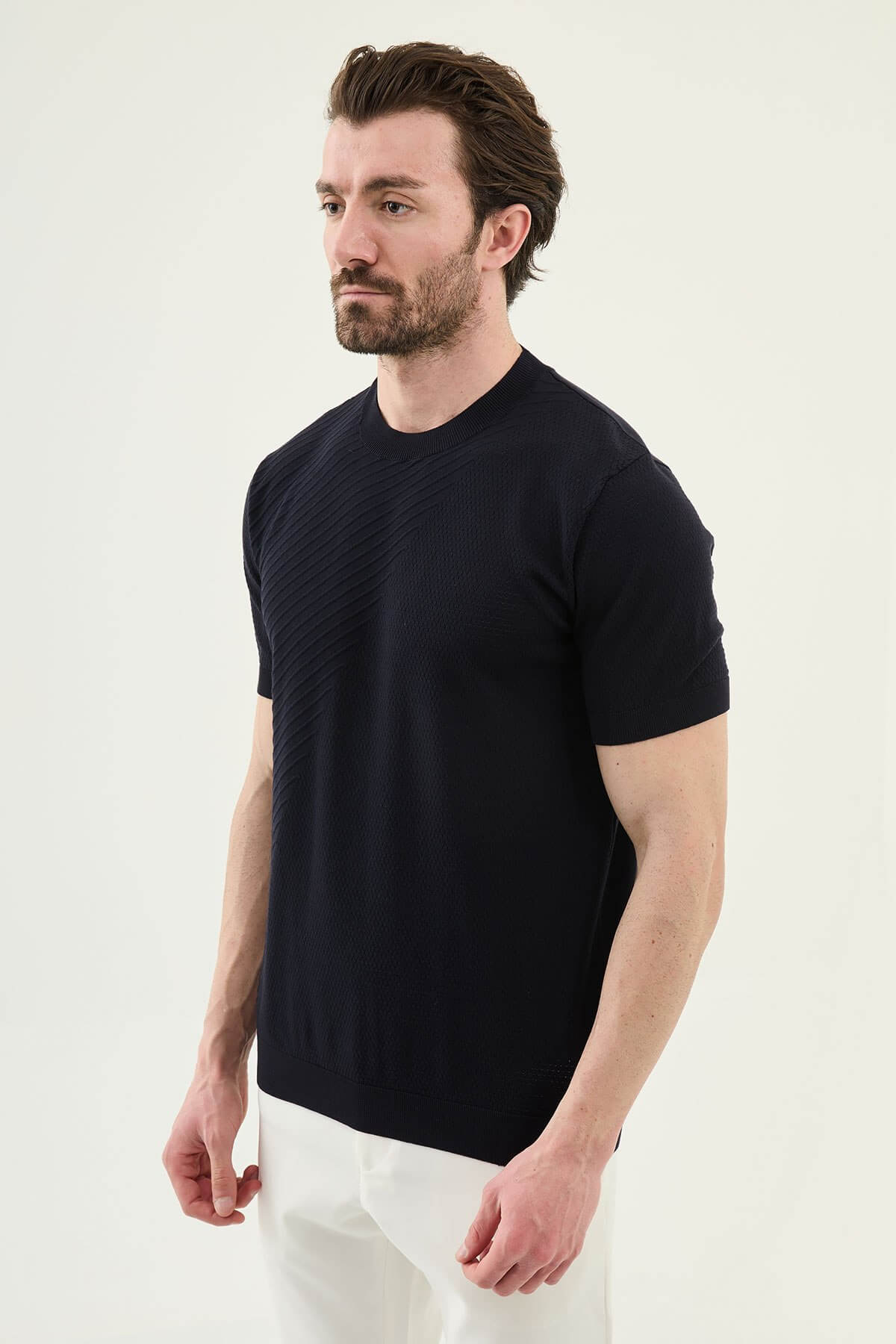 Men’s navy blue slim fit textured crew neck T-shirt with diagonal knit detail, short sleeves, modern casual style