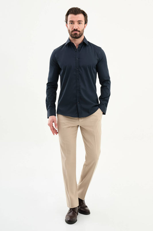 Men’s navy blue slim fit long sleeve dress shirt with stretch fabric and modern tailored formal style