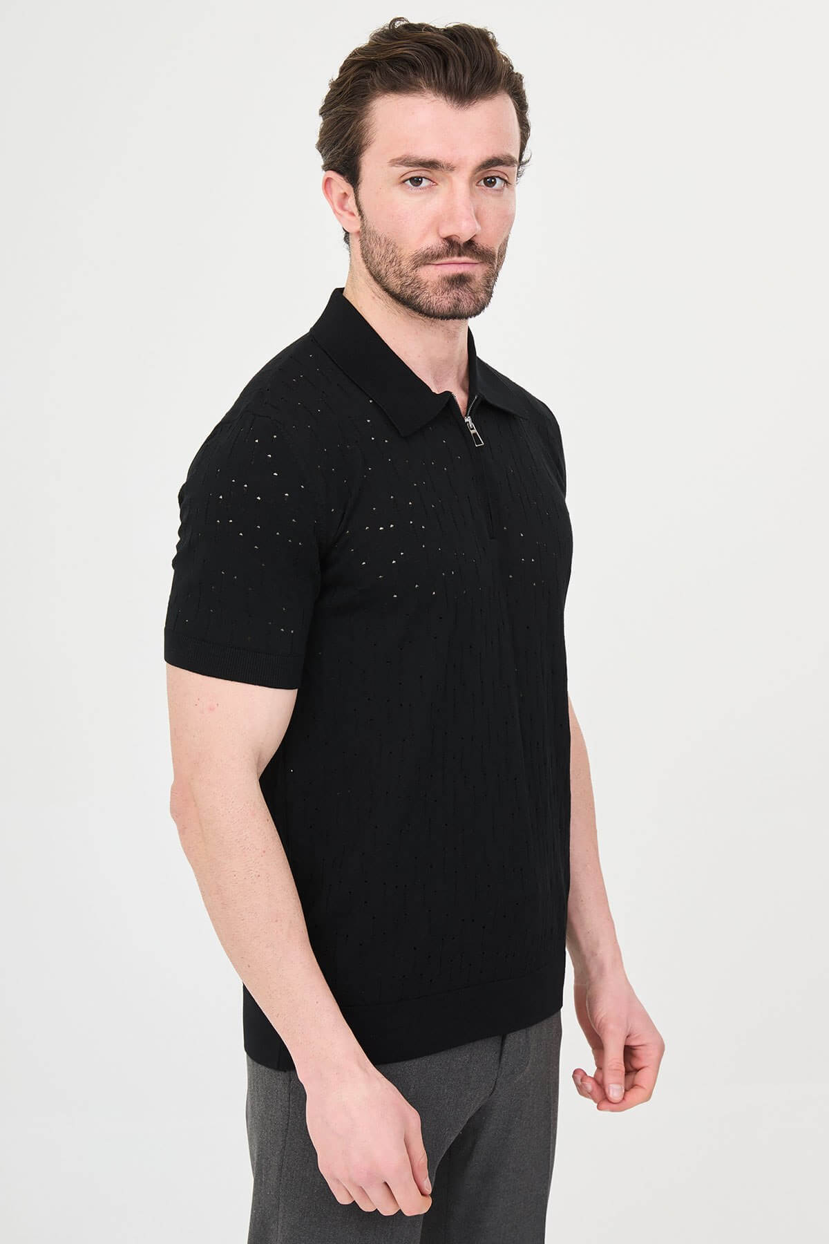 Men’s black slim fit zippered polo knit t-shirt with perforated texture, short sleeves, modern smart casual style