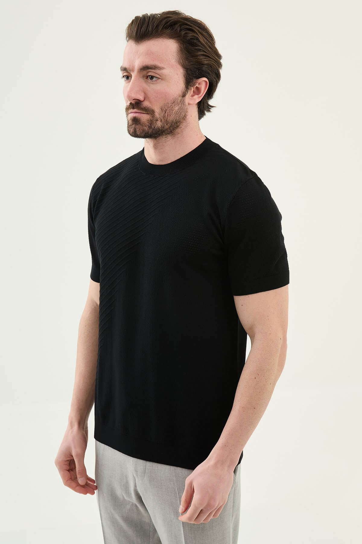 Men’s black slim fit textured crew neck T-shirt with diagonal knit detail, short sleeves, modern casual style