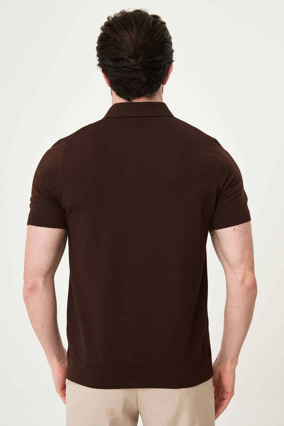 Men’s dark brown slim fit cotton polo shirt with short sleeves and stretch fabric, clean minimal casual style