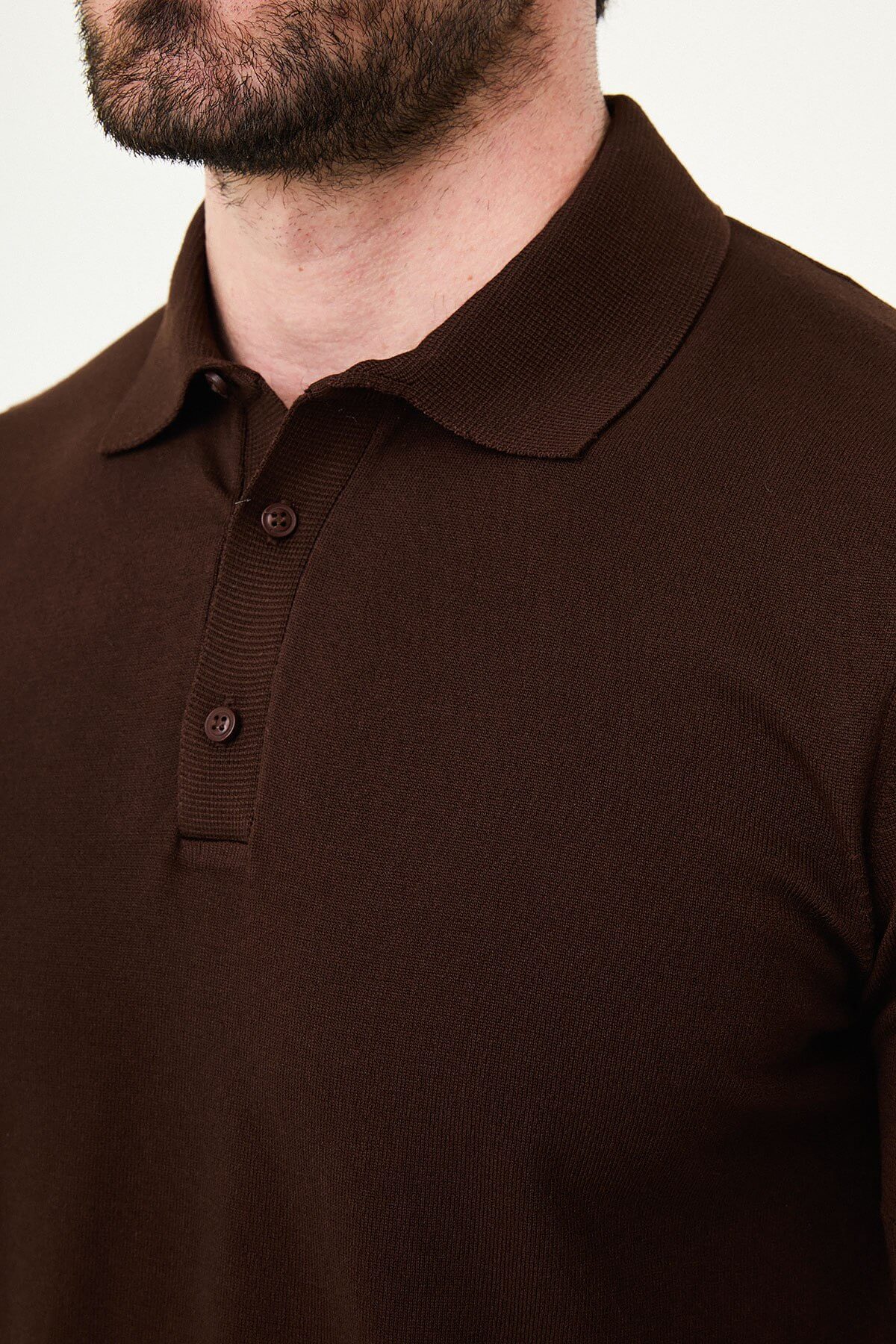 Men’s dark brown slim fit cotton polo shirt with short sleeves and stretch fabric, clean minimal casual style