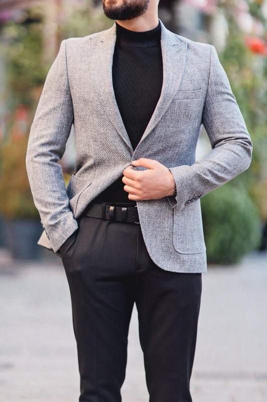 Men’s gray textured mono-collar slim-fit jacket styled with black turtleneck