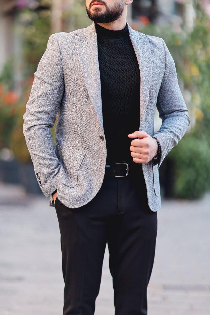 Men’s gray textured mono-collar slim-fit jacket styled with black turtleneck