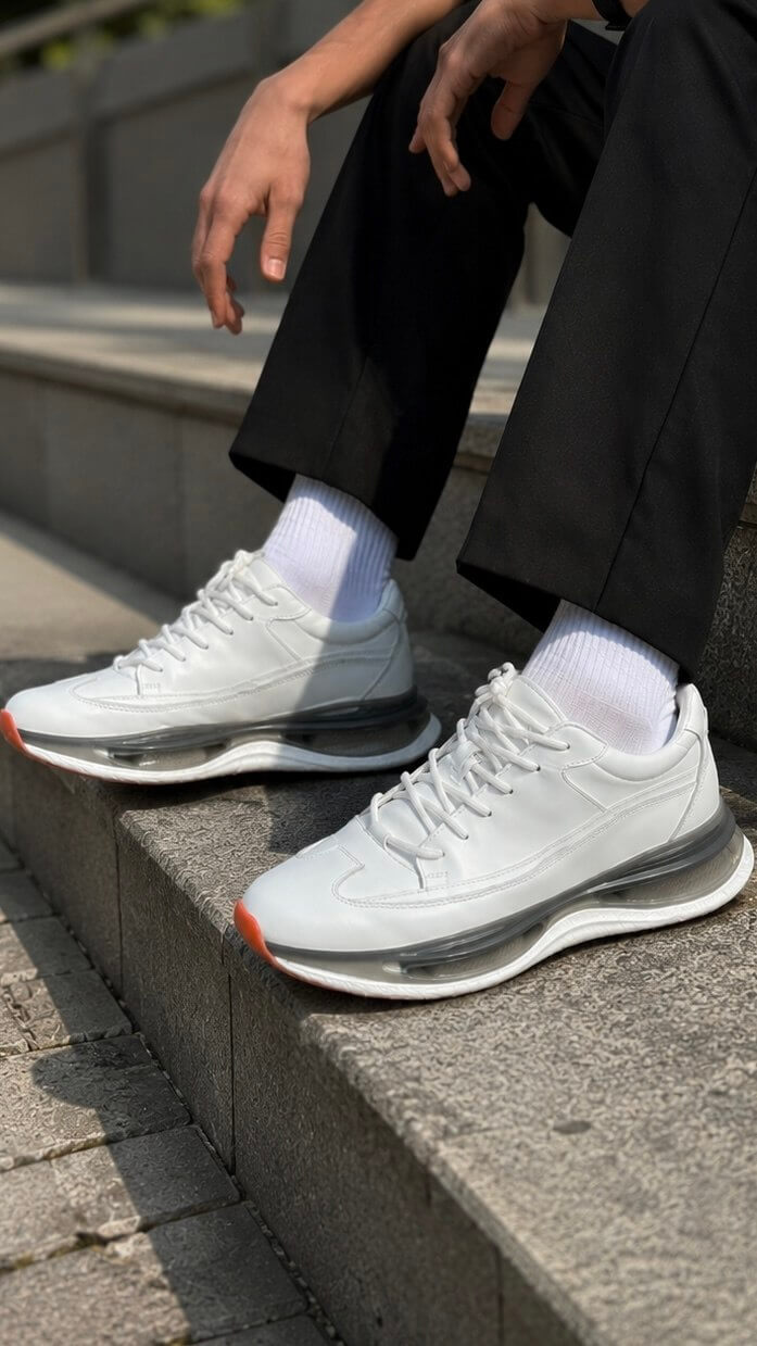 White leather trainer sneaker for men with clean solid finish, side view