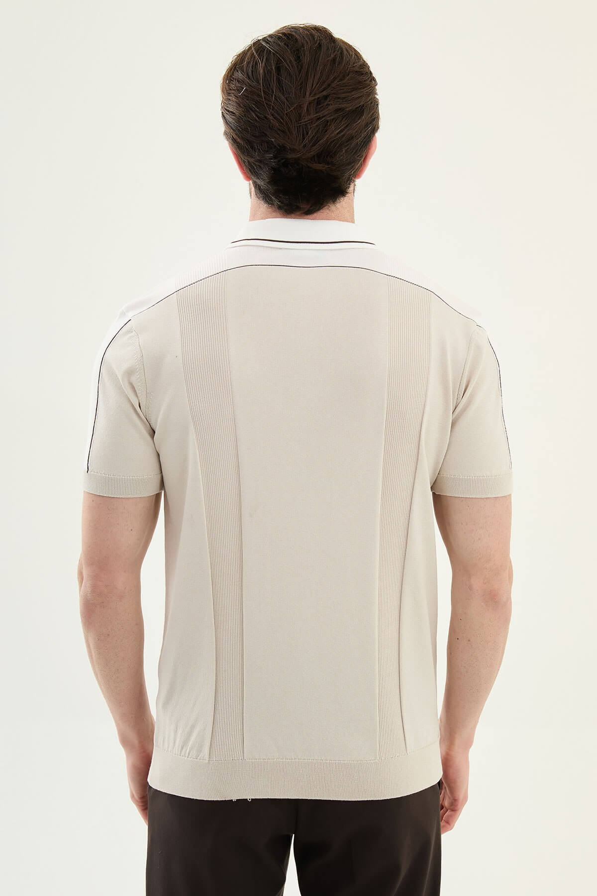 Men’s beige colorblock slim fit knit polo shirt with contrast collar styled for a refined summer smart-casual outfit.