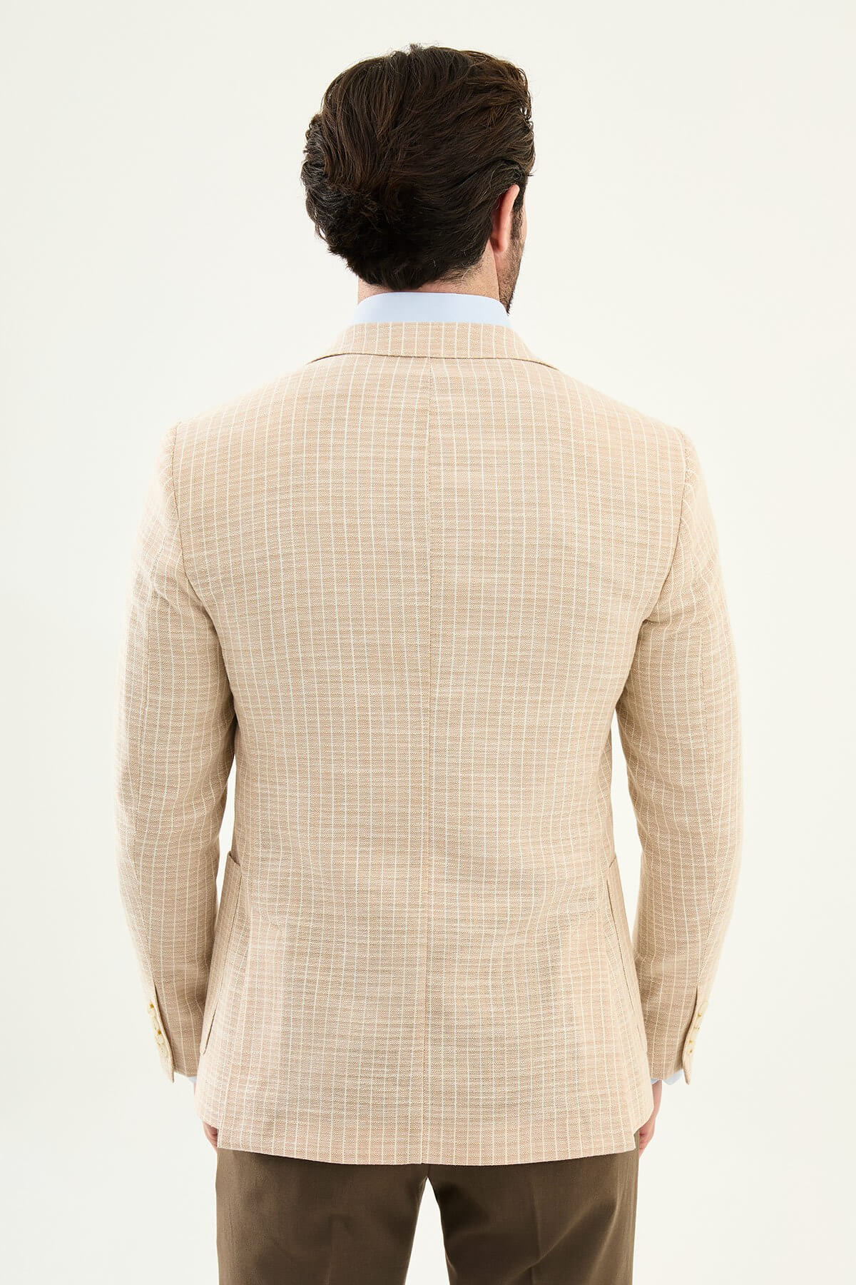 Men’s beige slim fit cotton linen blazer with a lightweight textured finish, tailored for smart casual and formal summer styling.