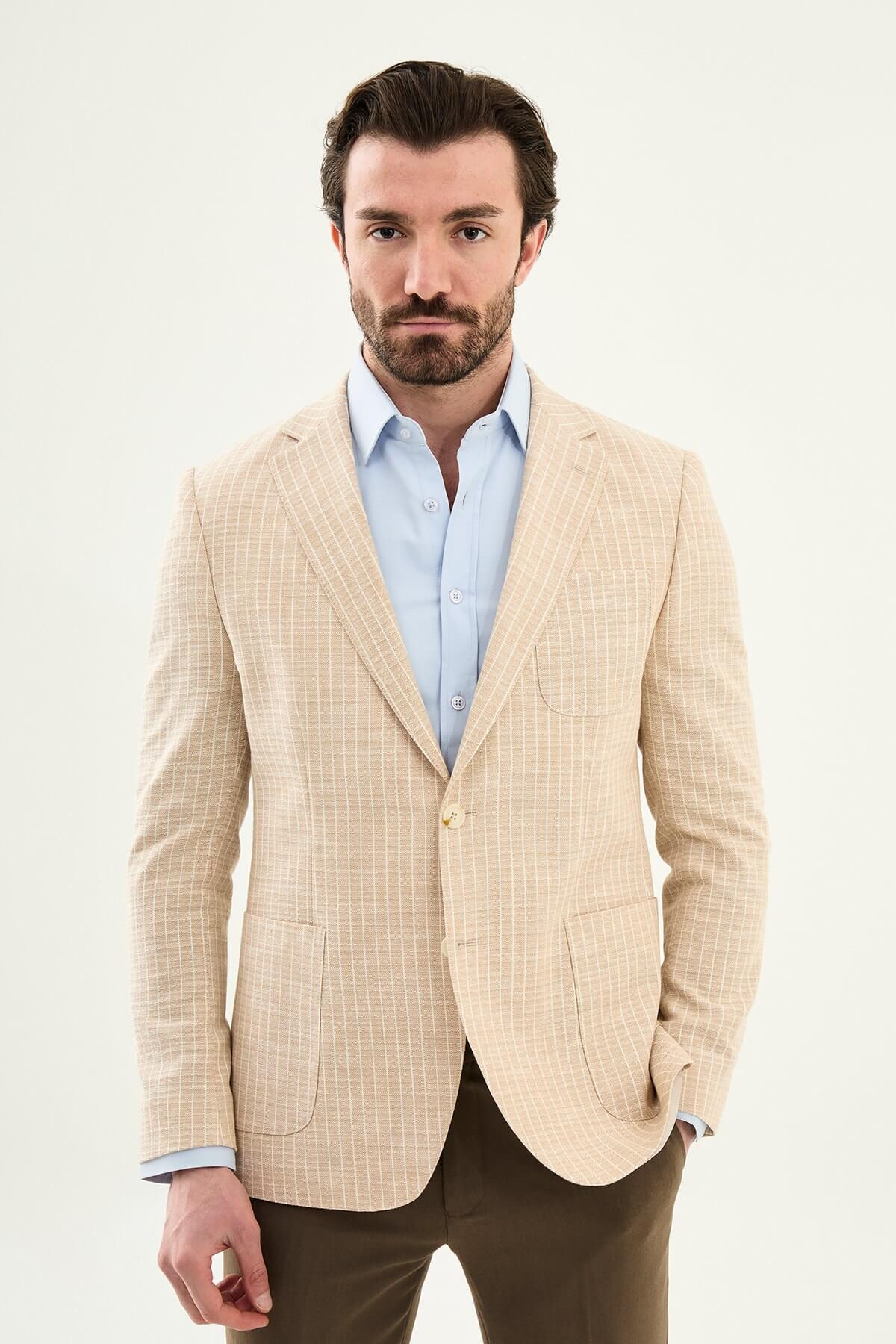 Men’s beige slim fit cotton linen blazer with a lightweight textured finish, tailored for smart casual and formal summer styling.