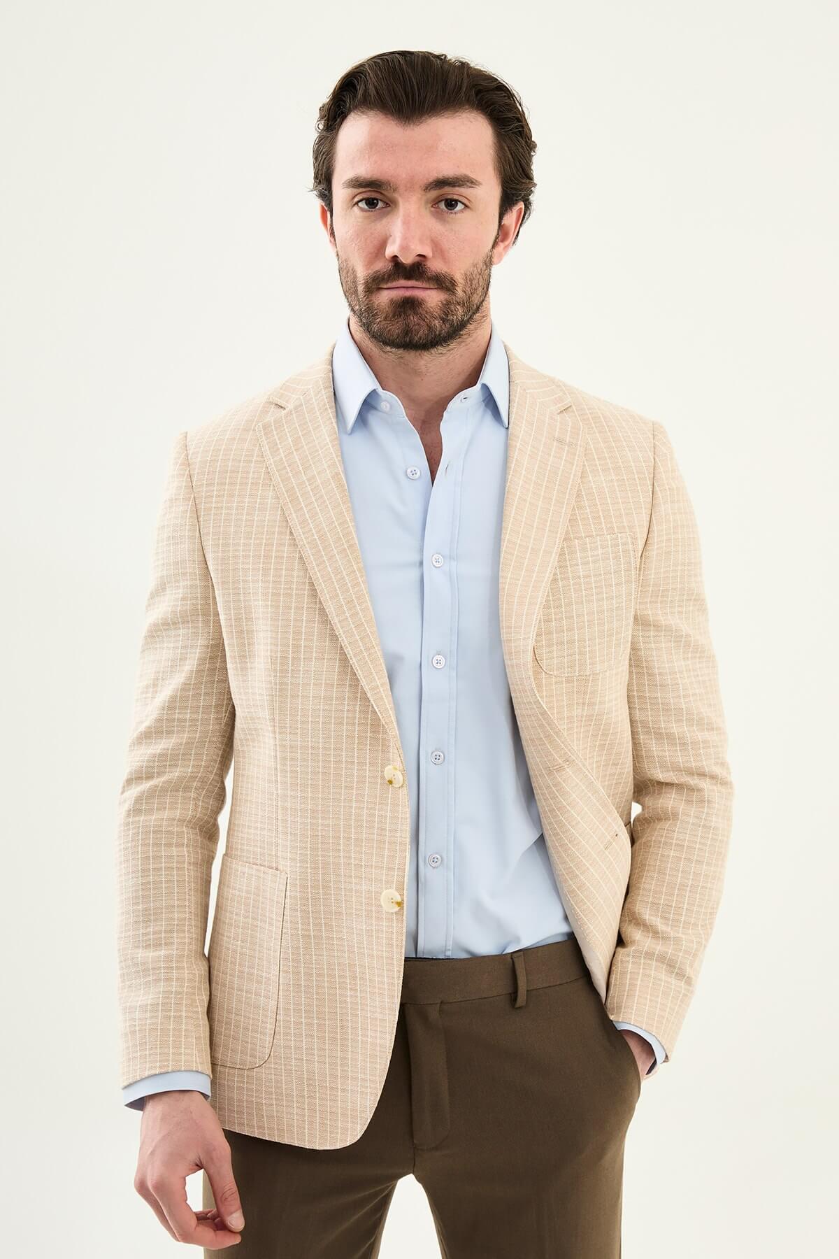 Men’s beige slim fit cotton linen blazer with a lightweight textured finish, tailored for smart casual and formal summer styling.