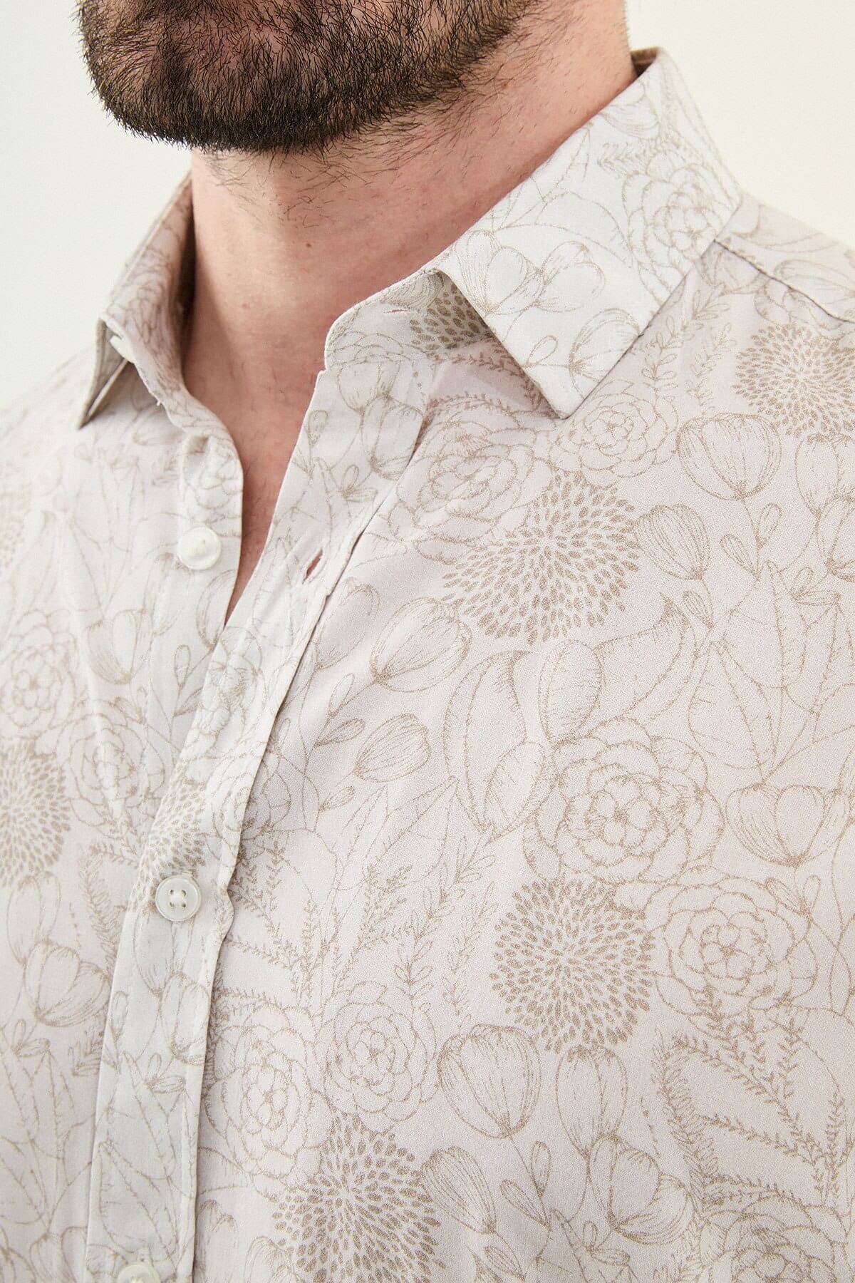Men wearing a beige floral patterned slim-fit shirt, long sleeves, standing straight against a plain background