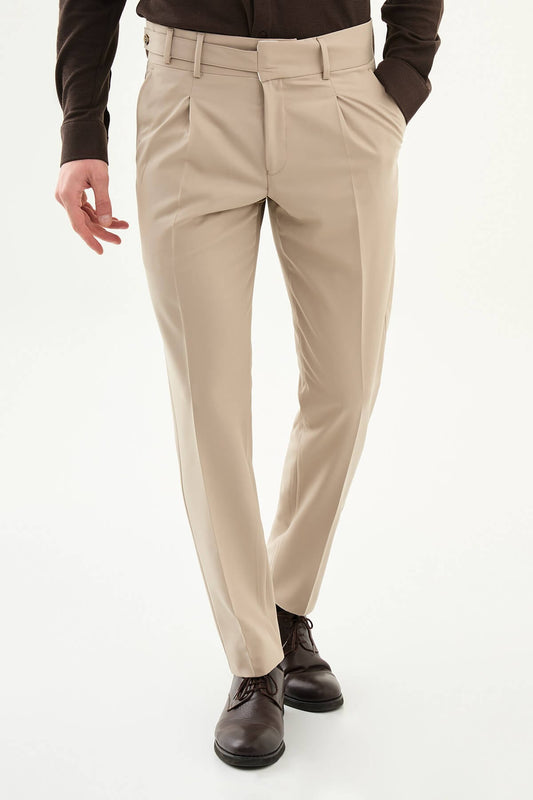 Beige slim-fit straight-leg pleated trousers for men, styled with brown leather shoes, ideal for summer business and formal occasions.