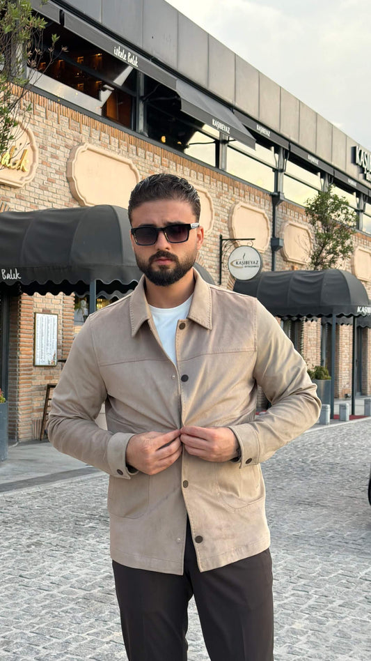 Men’s beige overshirt jacket with button closure and front pockets styled for fall winter casual fashion