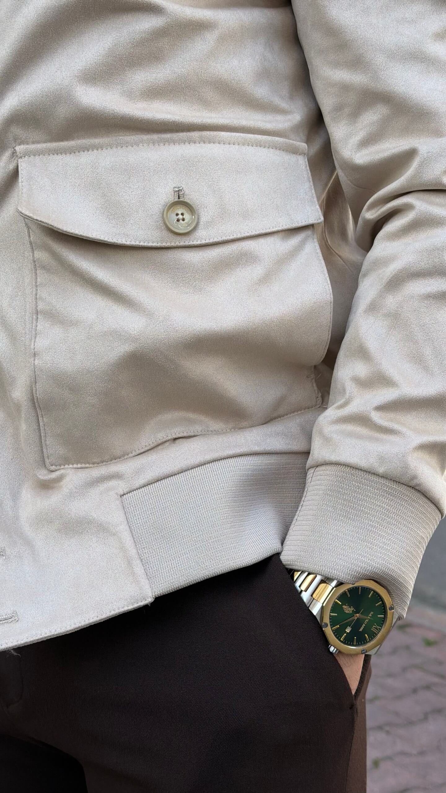 Beige flight jacket close-up showing suede-look texture