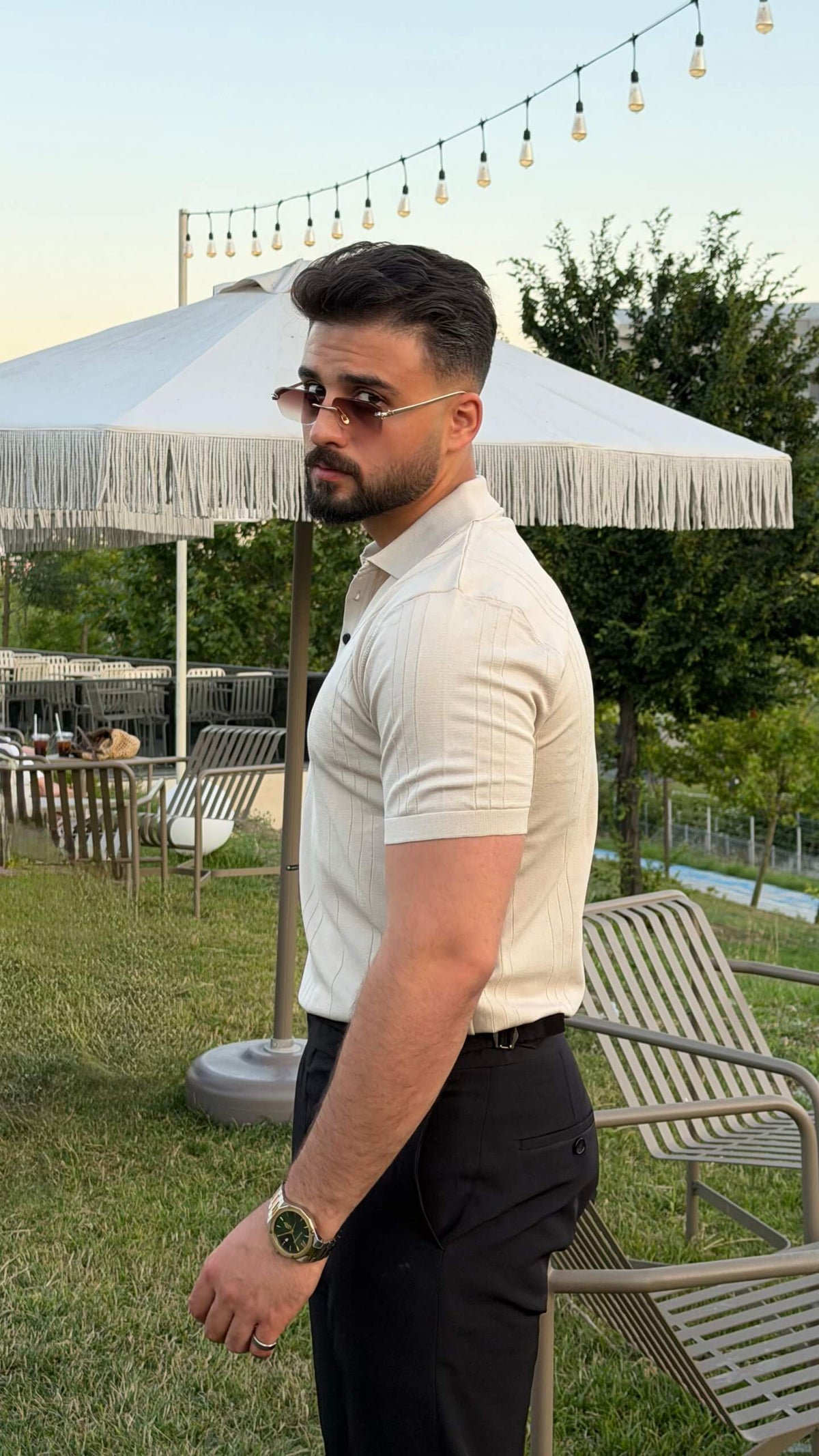 Men’s beige textured knit polo shirt with short sleeves and smart casual summer styling