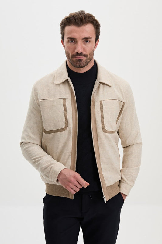 Men's beige wool-blend fall jacket with contrasting chest pockets and a classic collar.