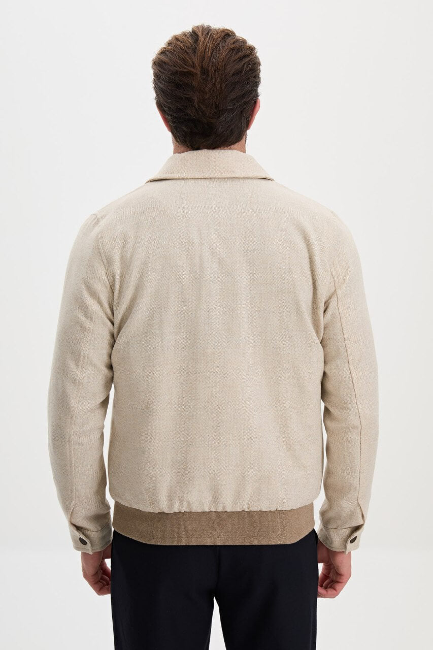 Men's beige wool-blend fall jacket with contrasting chest pockets and a classic collar.