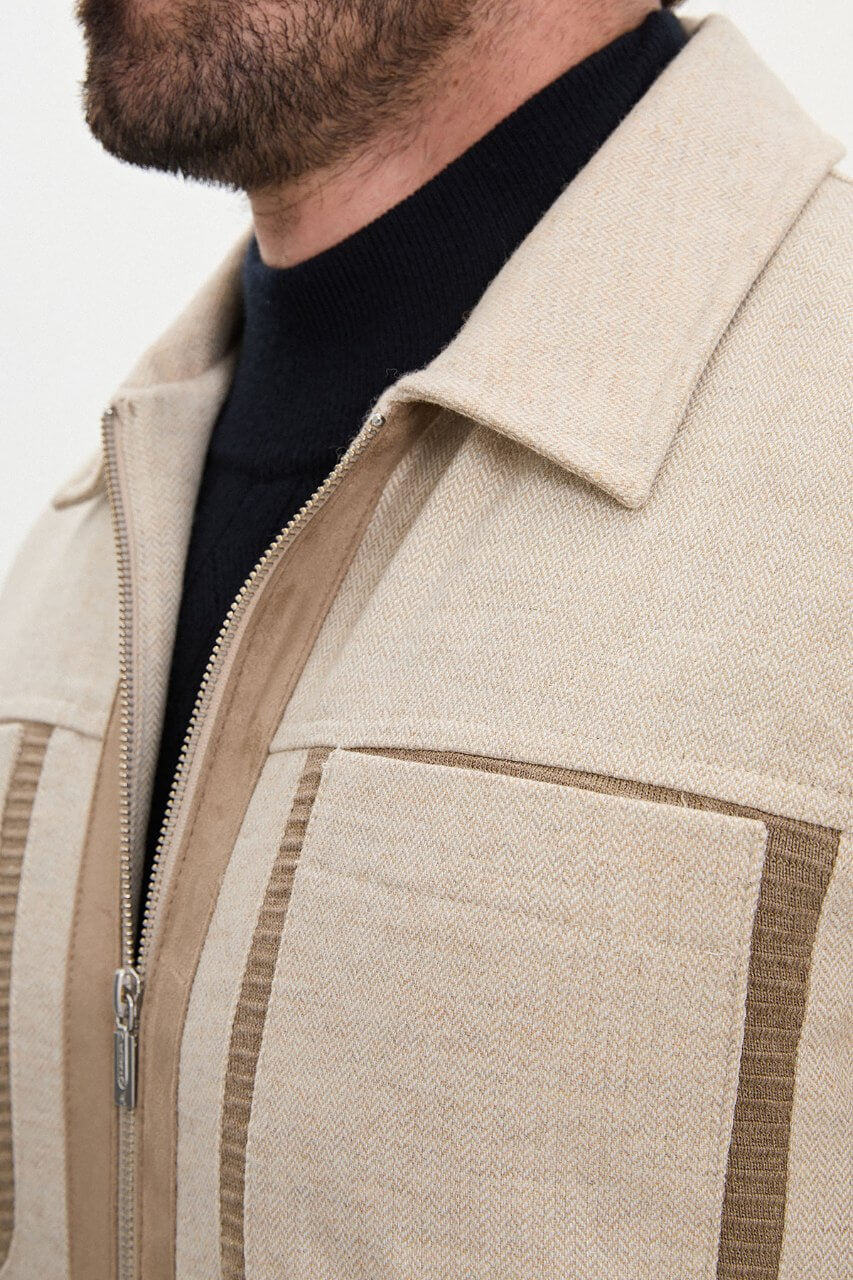 Men's beige wool-blend fall jacket with contrasting chest pockets and a classic collar.