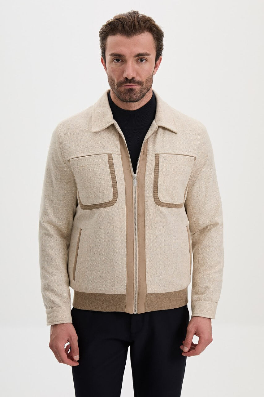 Men's beige wool-blend fall jacket with contrasting chest pockets and a classic collar.