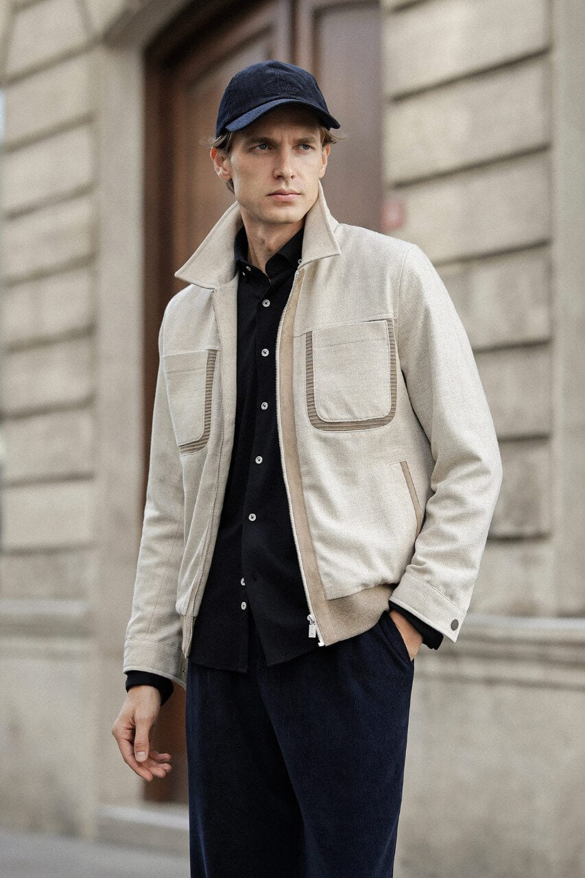 Men's beige wool-blend fall jacket with contrasting chest pockets and a classic collar.