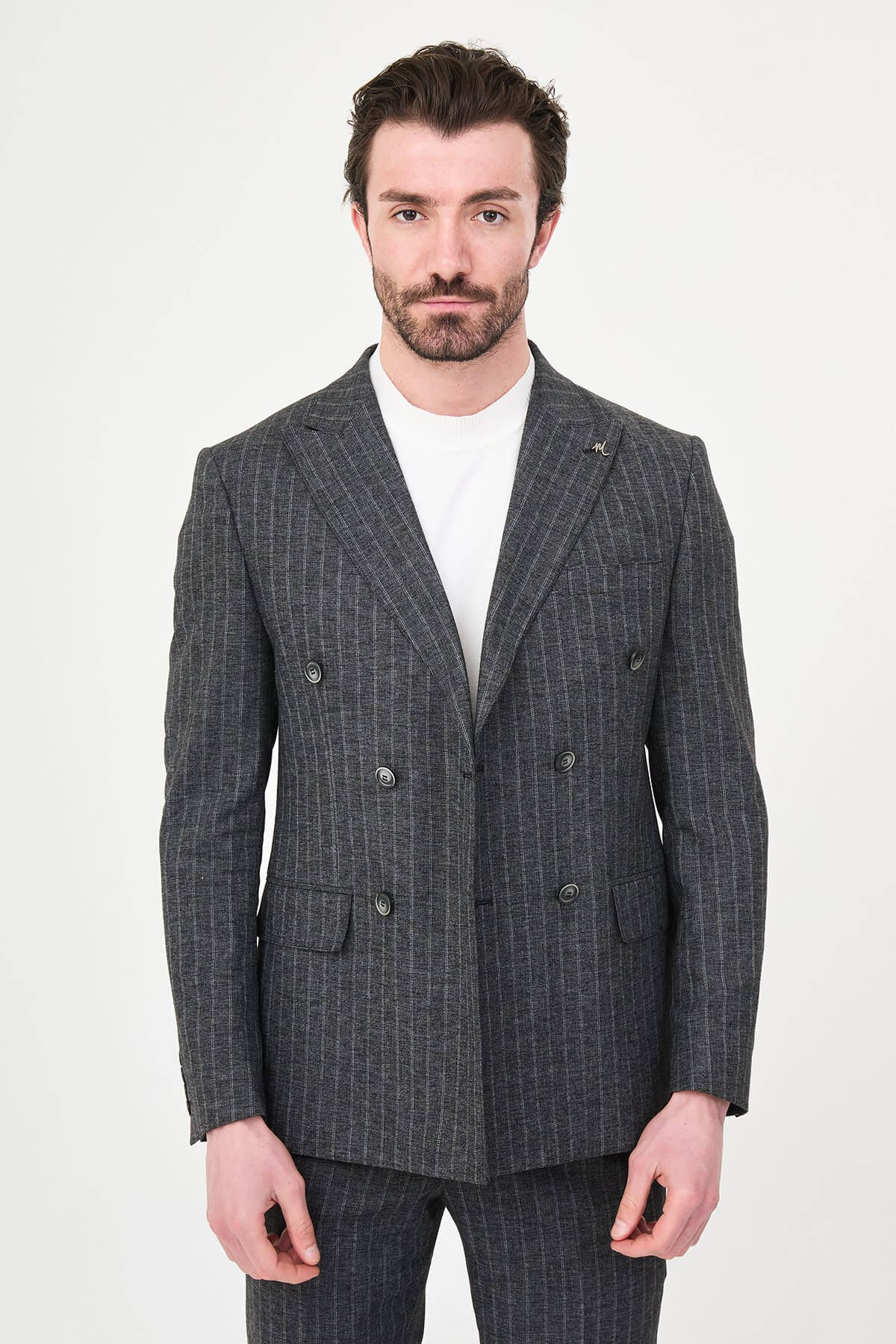 Men’s Black Charcoal Pinstripe Double-Breasted Suit on a male model, slim fit, paired with black dress shoes.