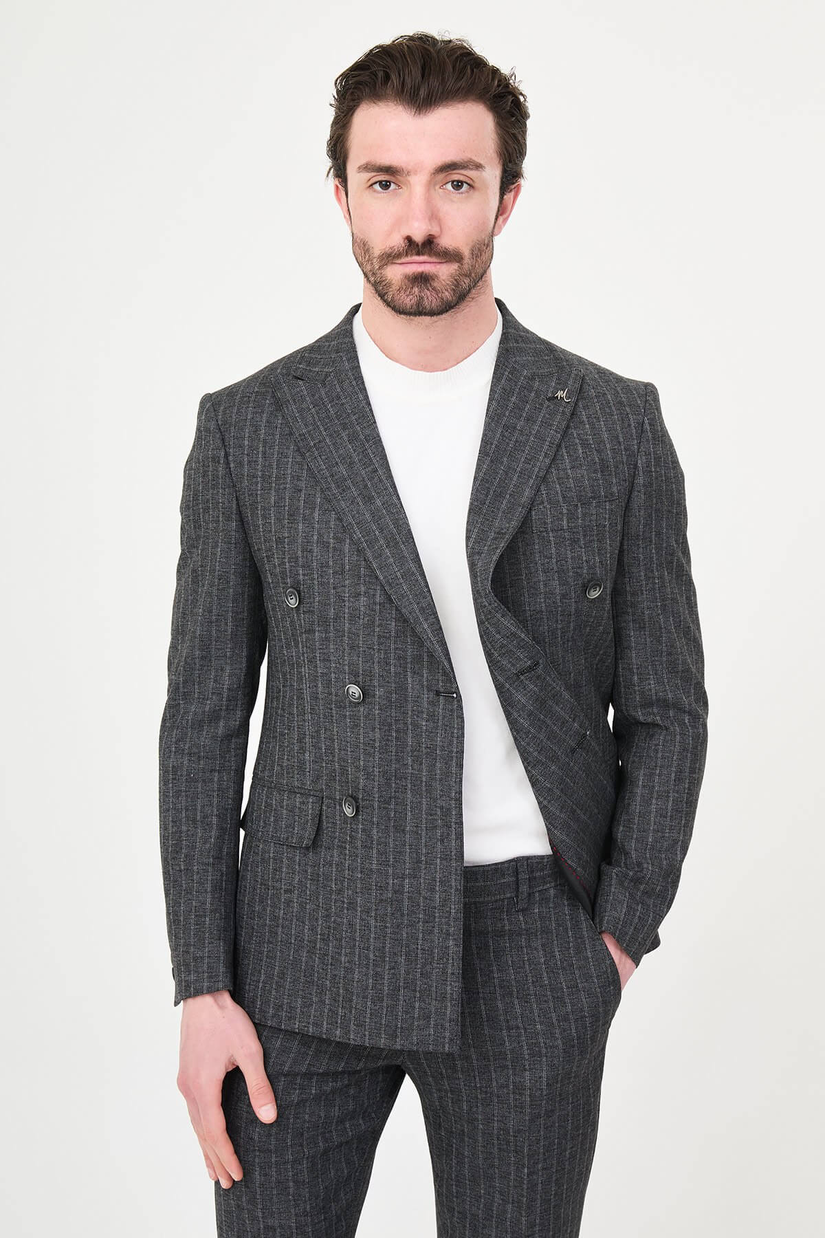 Men’s Black Charcoal Pinstripe Double-Breasted Suit on a male model, slim fit, paired with black dress shoes.