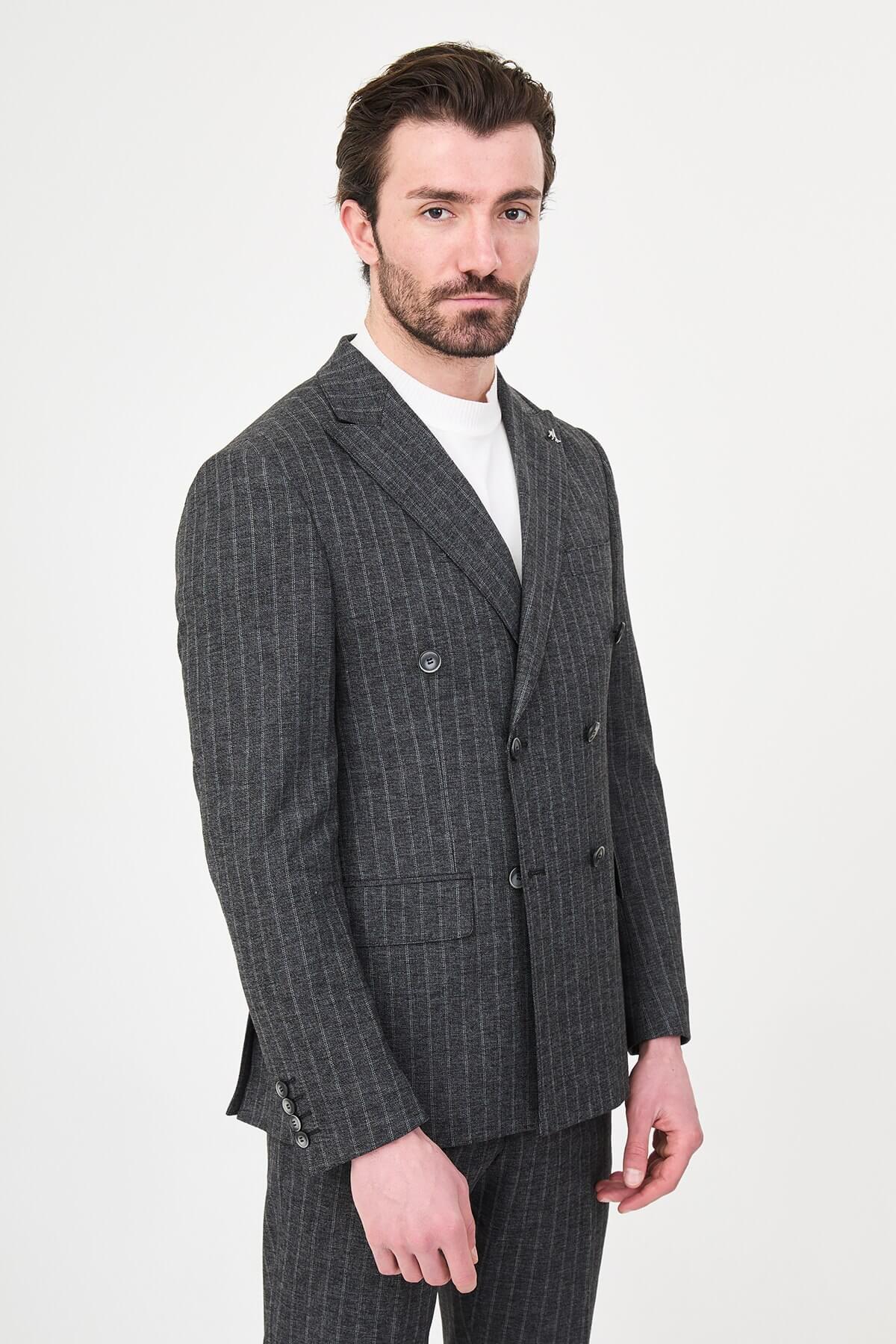 Men’s Black Charcoal Pinstripe Double-Breasted Suit on a male model, slim fit, paired with black dress shoes.
