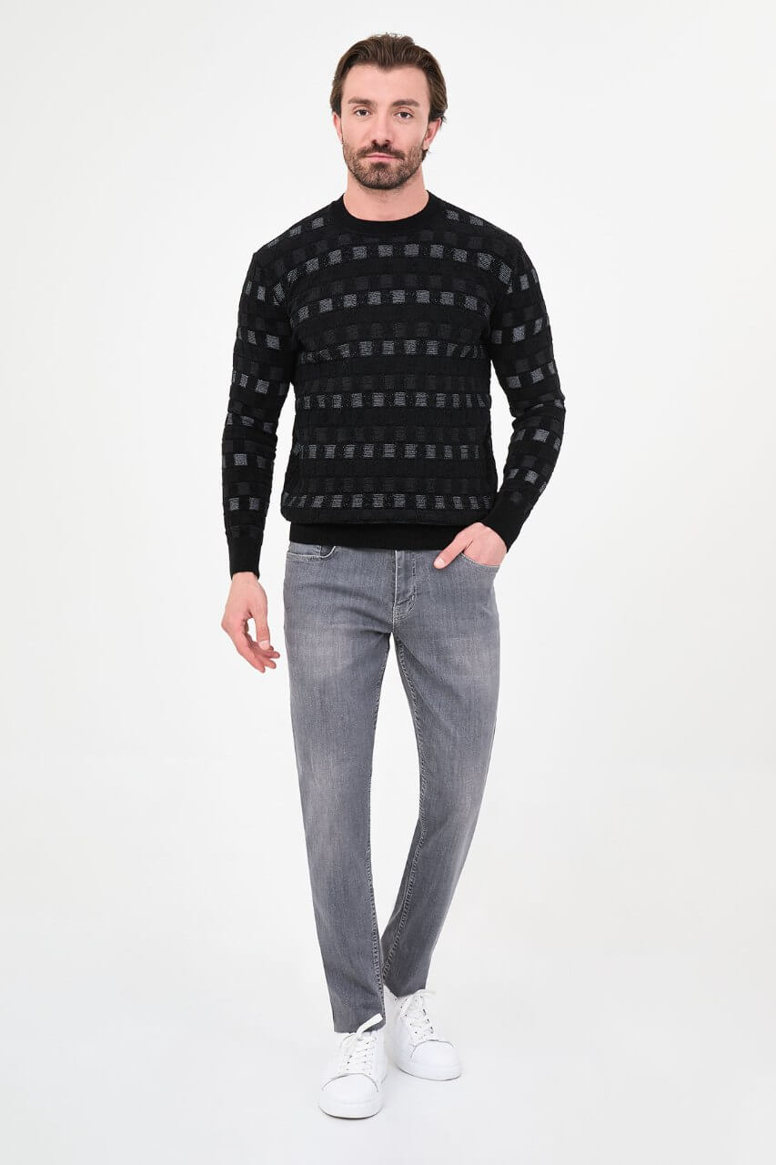 Men's black checkered textured crew neck knit sweater with patterned design for fall winter menswear.