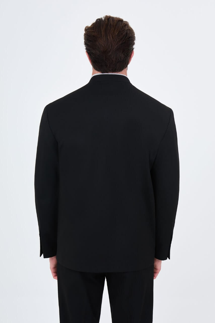 HolloMen men's black casual two-piece suit featuring a minimalist single-button jacket and matching trousers styled with a grey turtleneck.