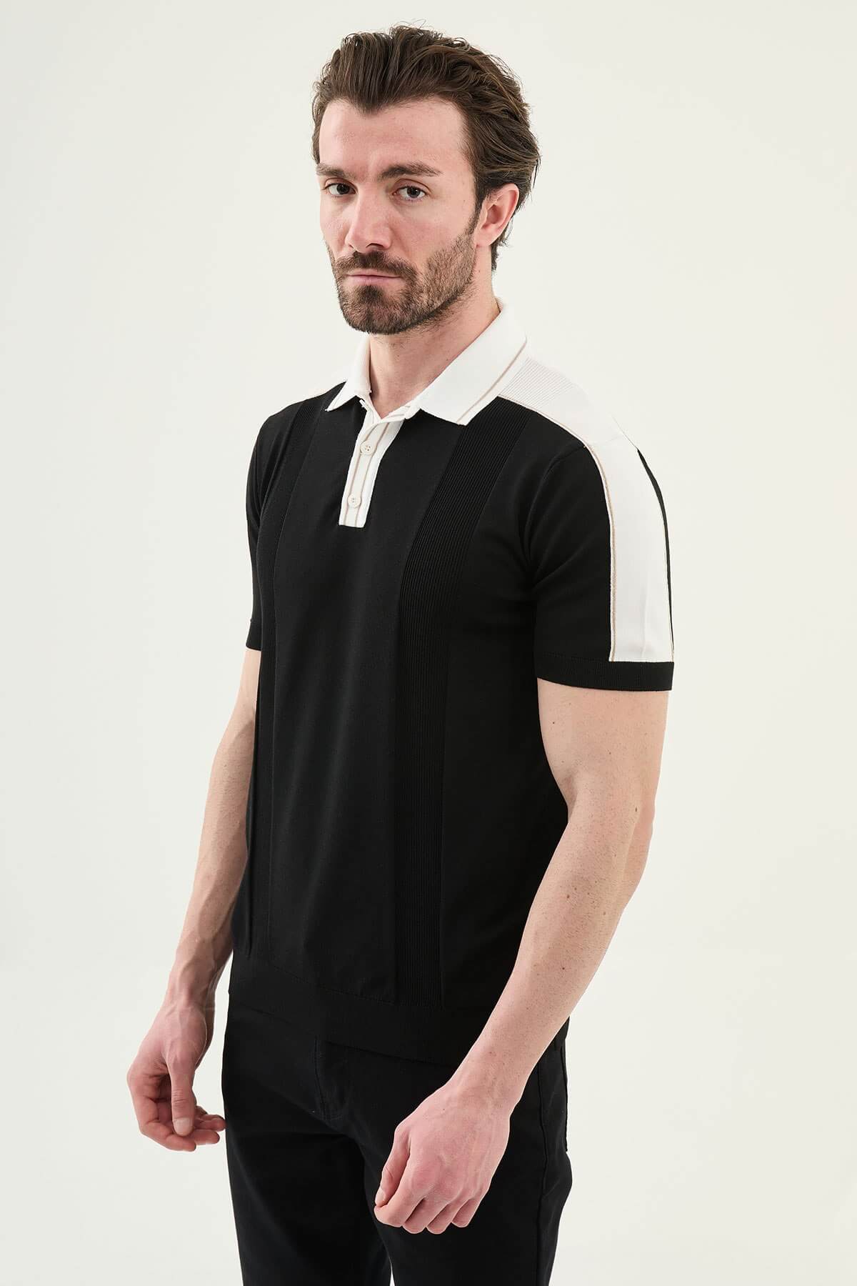 Men’s black colorblock slim fit knit polo shirt with contrast collar styled for modern summer smart-casual wear.