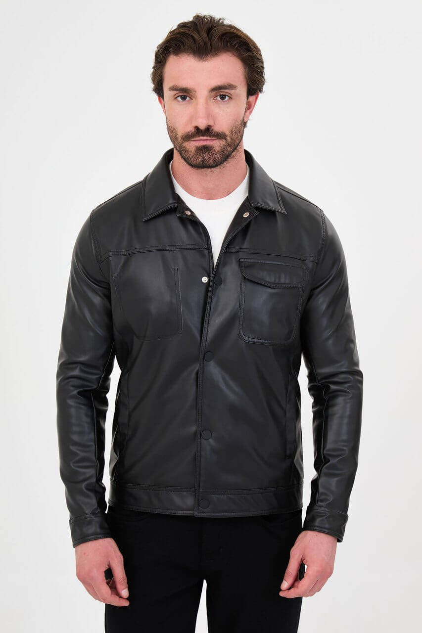 Men's black PU leather jacket styled with black trousers and a white crew-neck T-shirt.