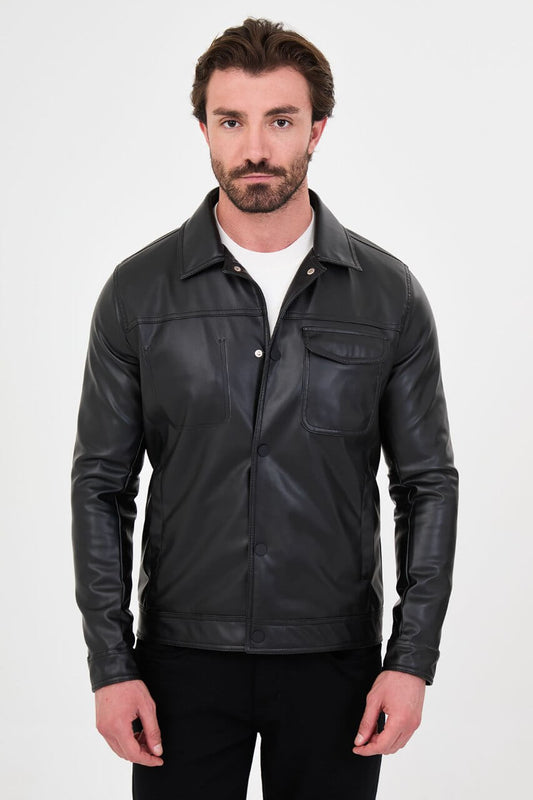 Men's black PU leather jacket styled with black trousers and a white crew-neck T-shirt.