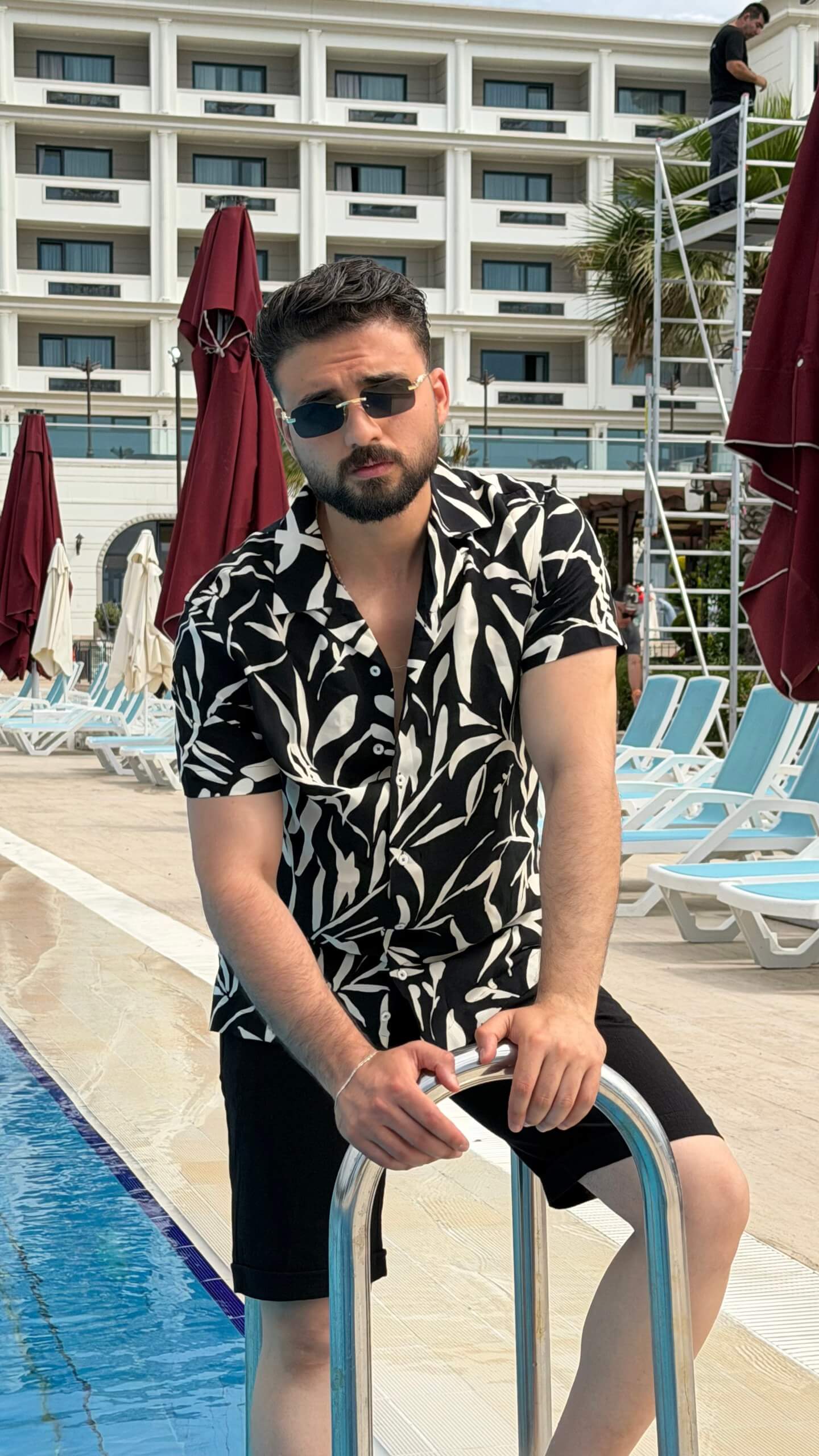 Men’s black beige floral print short sleeve shirt with lightweight viscose fabric, button-front design, and stylish summer casual look.