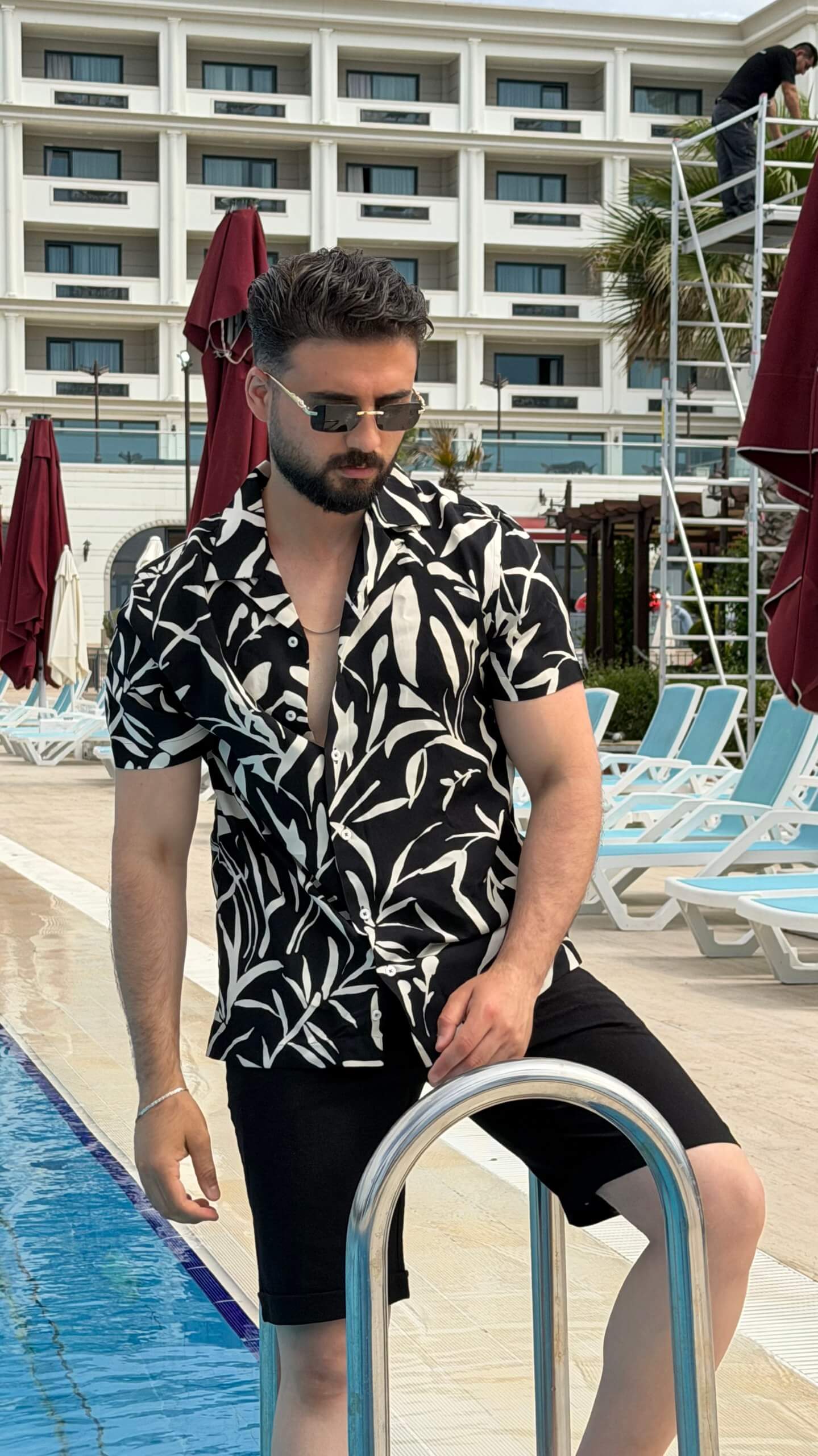 Men’s black beige floral print short sleeve shirt with lightweight viscose fabric, button-front design, and stylish summer casual look.