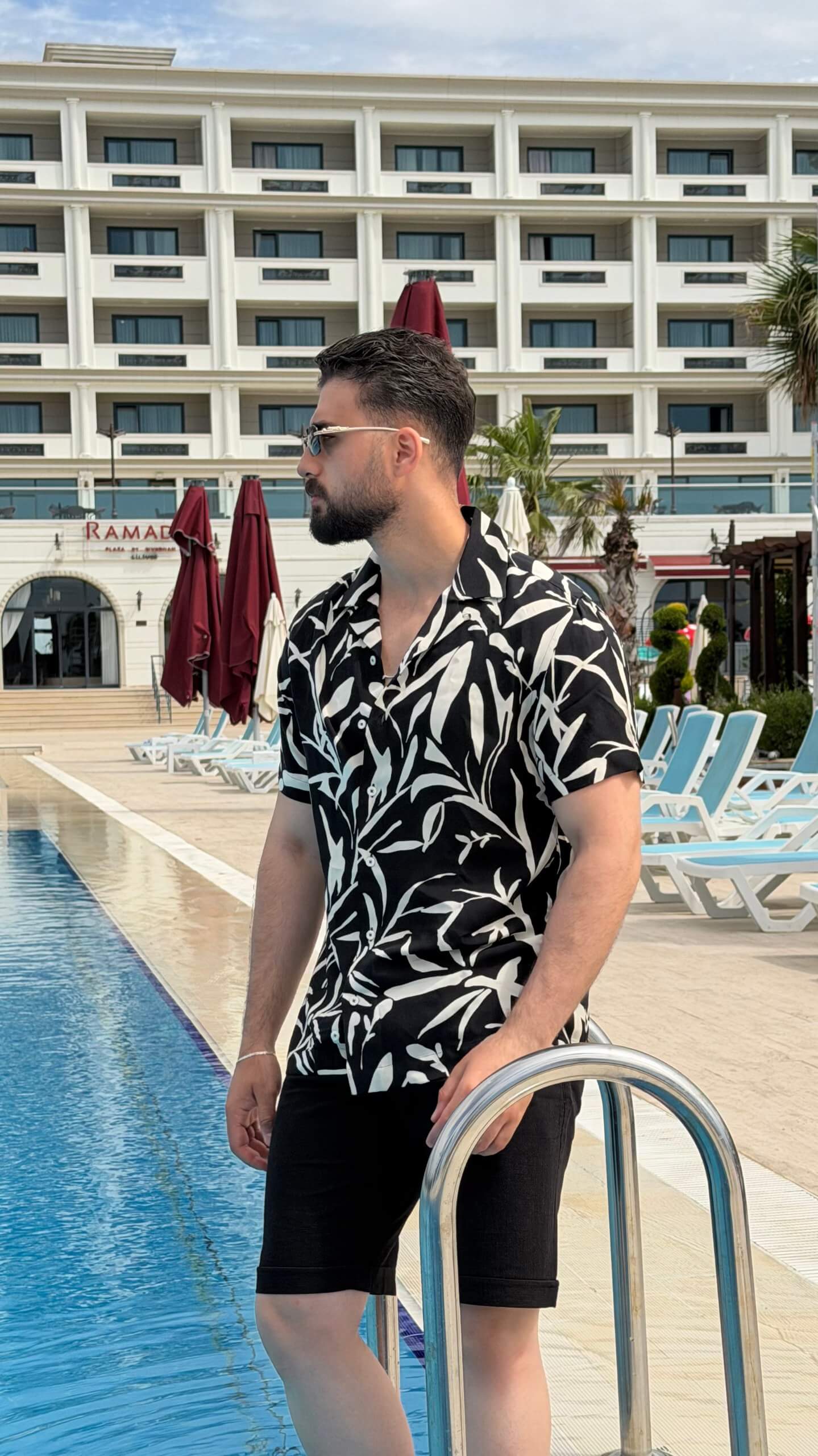Men’s black beige floral print short sleeve shirt with lightweight viscose fabric, button-front design, and stylish summer casual look.