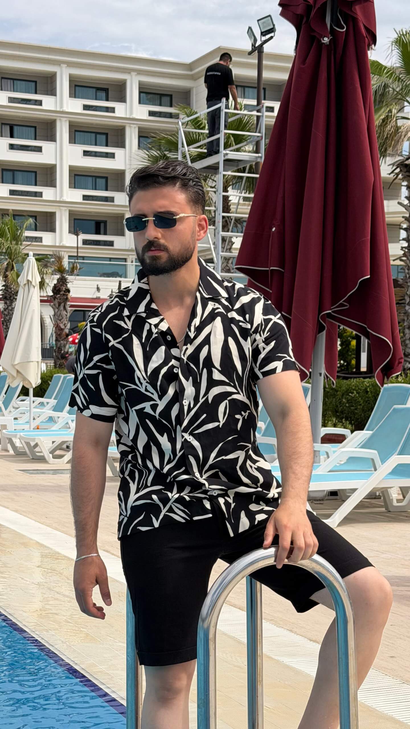 Men’s black beige floral print short sleeve shirt with lightweight viscose fabric, button-front design, and stylish summer casual look.