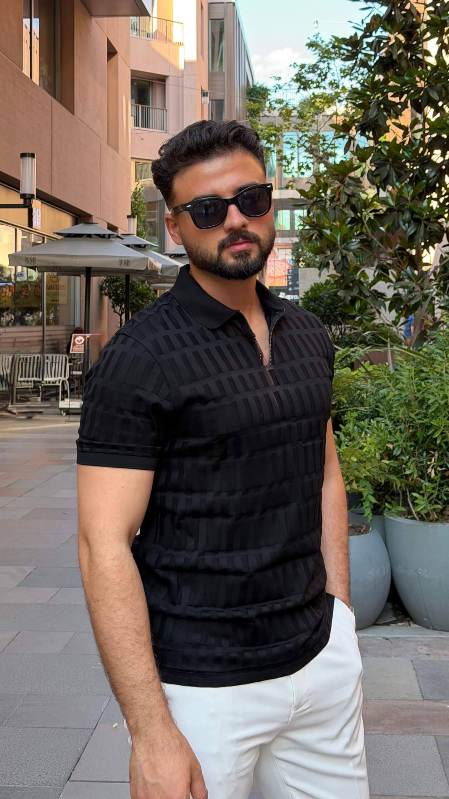 Men’s black textured pure cotton polo shirt with modern smart-casual style